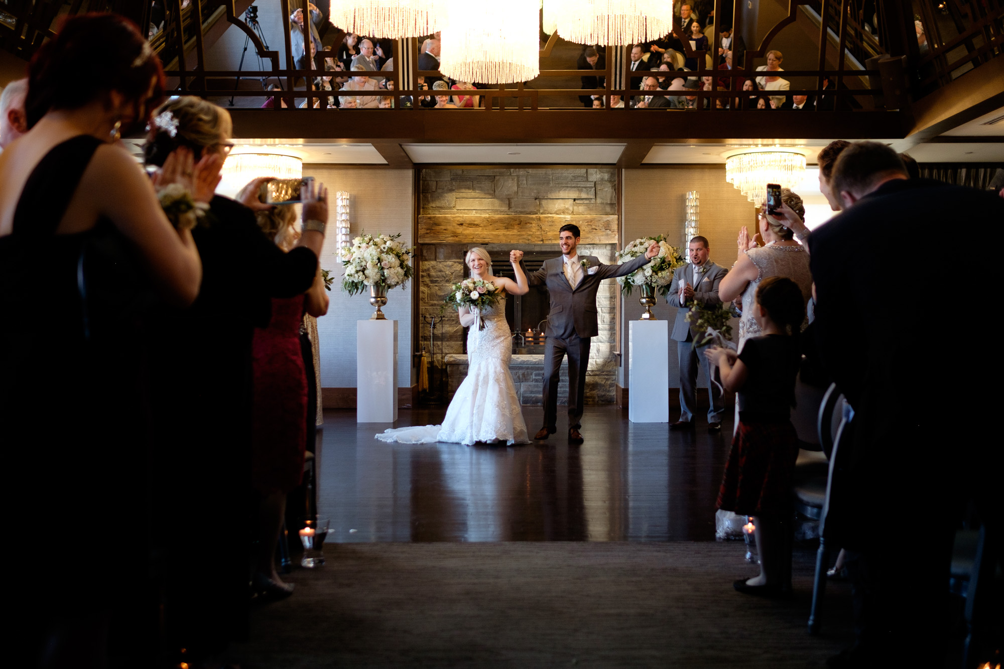Sarah and Rob celebrate with their guests after their wedding ceremony at Whistle Bear in Cambridge, Ontario. 