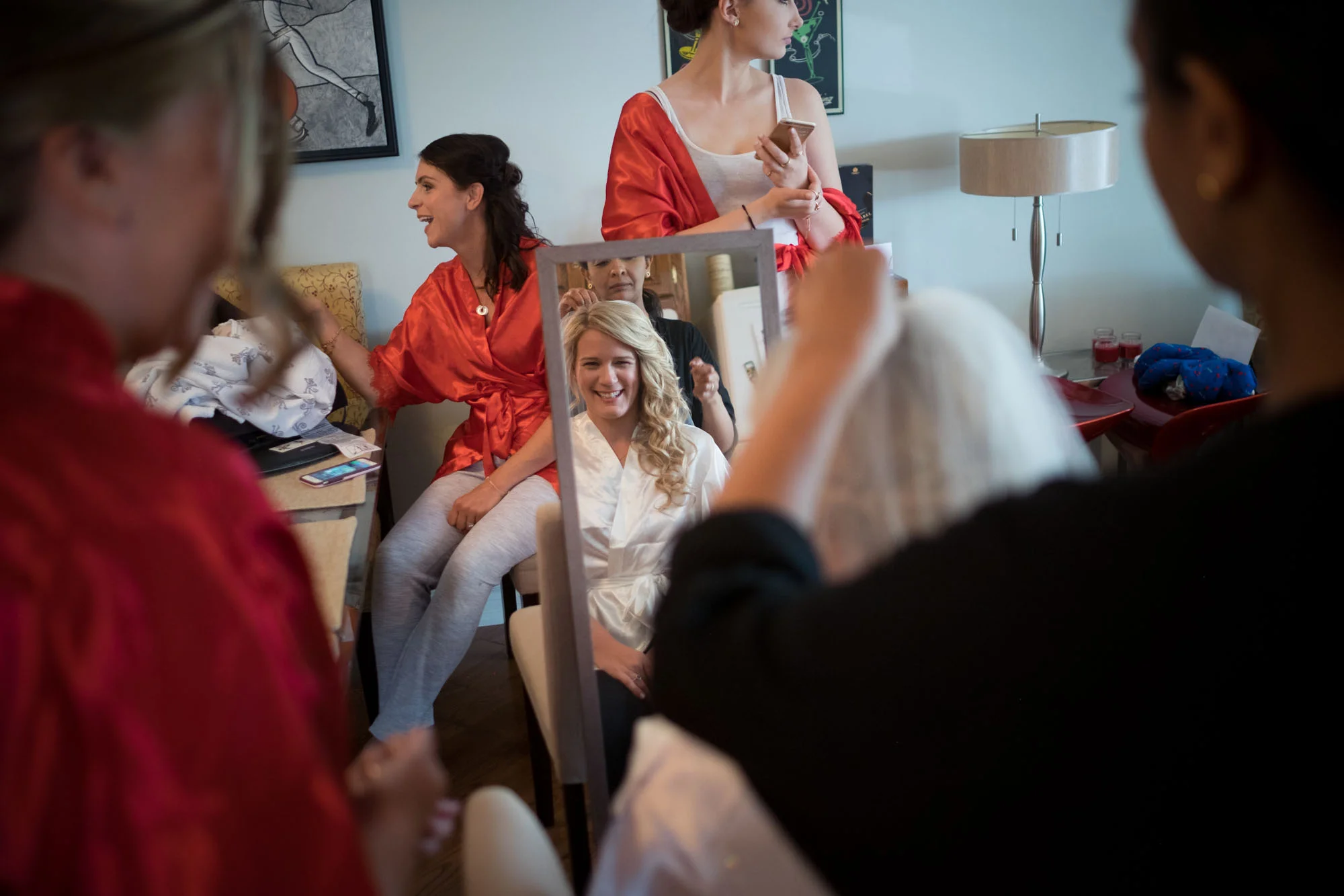 Sarah has her make up applied before her wedding at the Fermenting Cellar in Toronto's Distillery District.