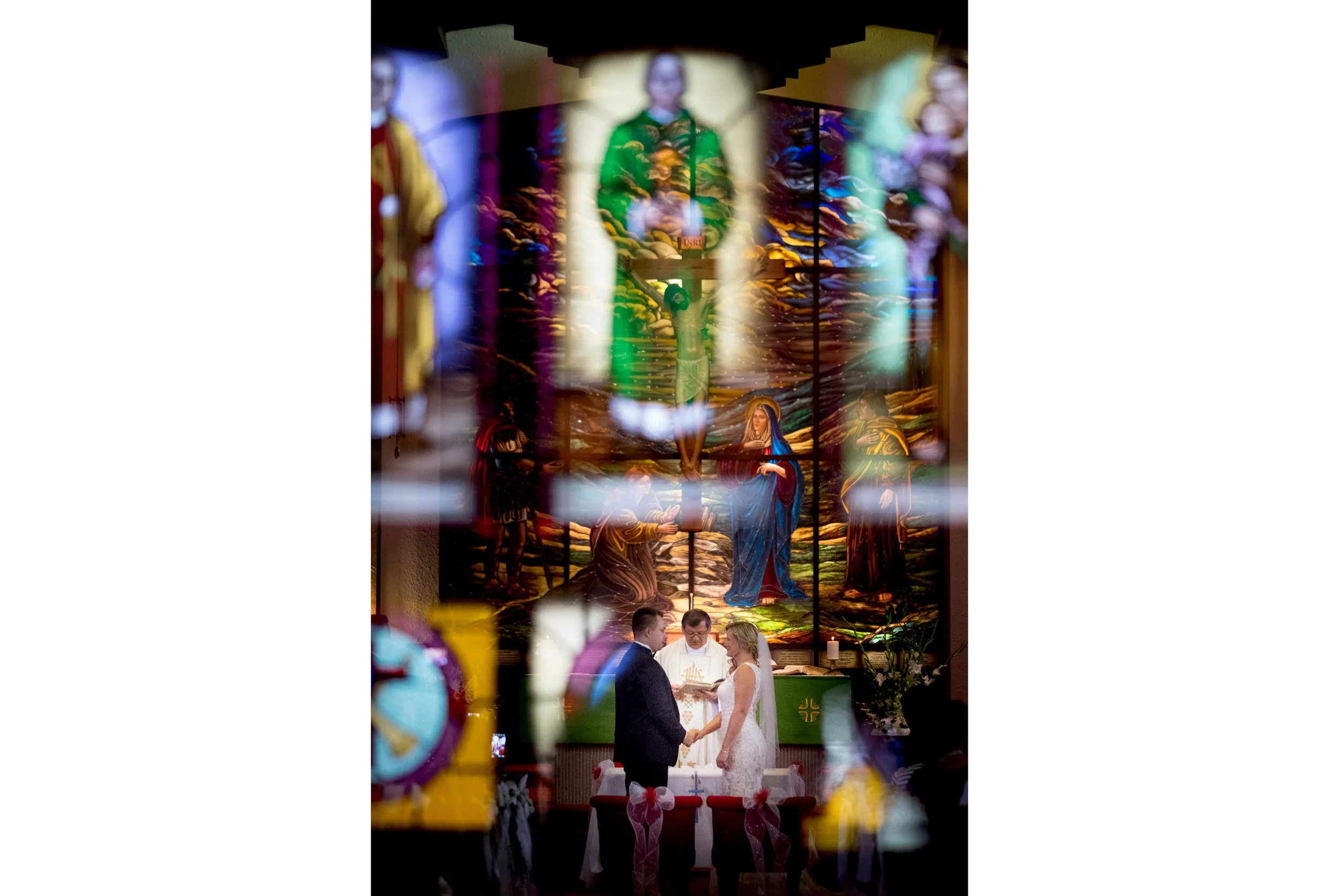 A photograph from the wedding ceremony of Sarah + Konrad before their wedding reception at Fermenting Cellar in Toronto.