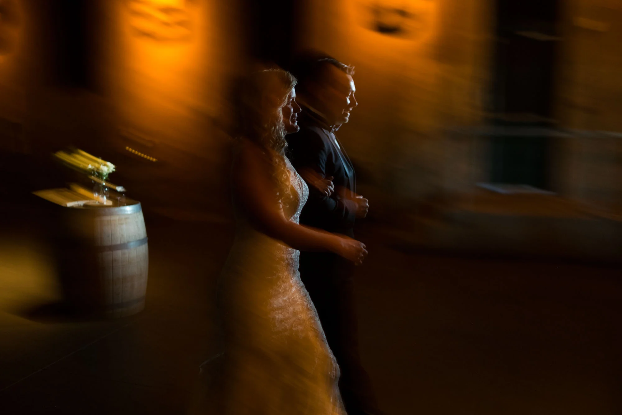Sarah and Konrad make their entrance during their wedding reception at the Fermenting Cellar in Toronto.