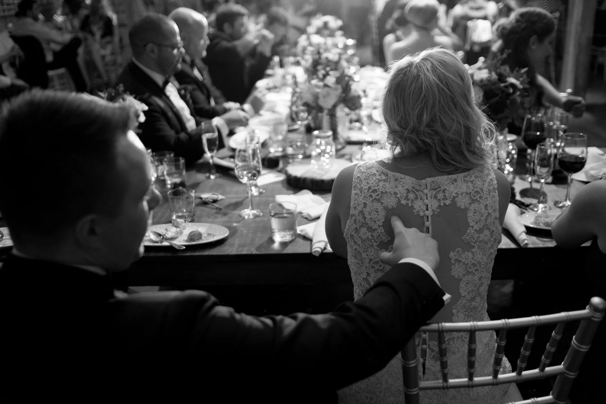 A moment during the wedding reception at the Fermenting Cellar in Toronto's Distillery District.