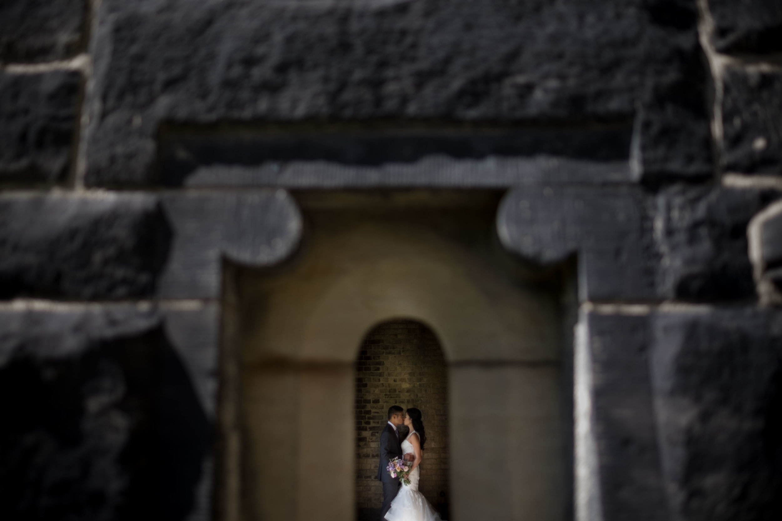 A wedding portrait of Linda + Andrew on their wedding day at the University of Toronto.
