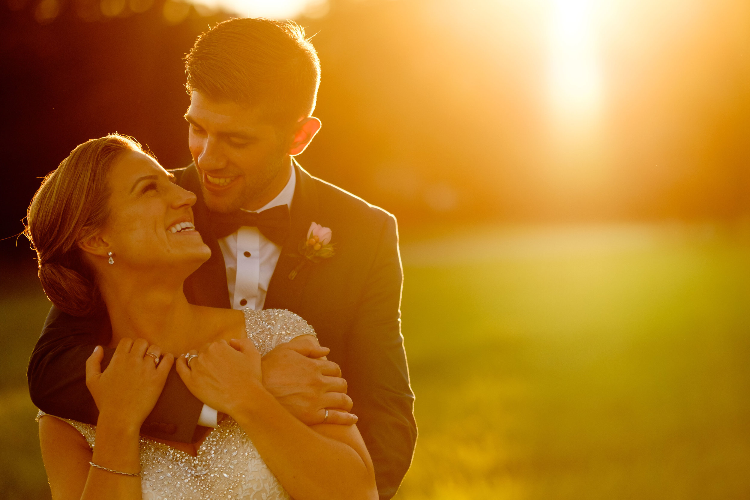A wedding portrait of Sabrina + Zach at sunset during their wedding reception at the Jewel Event Centre.