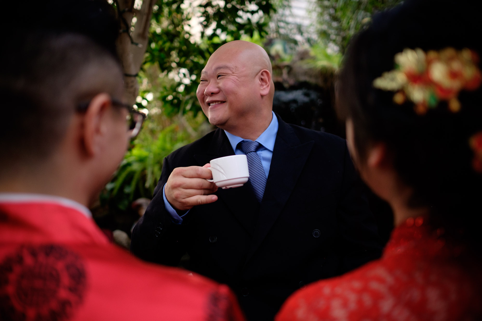  A photograph from the traditional Chinese Tea Ceremony at Andrea + Chris' wedding at Marsden Greenhouse outside of Toronto. 