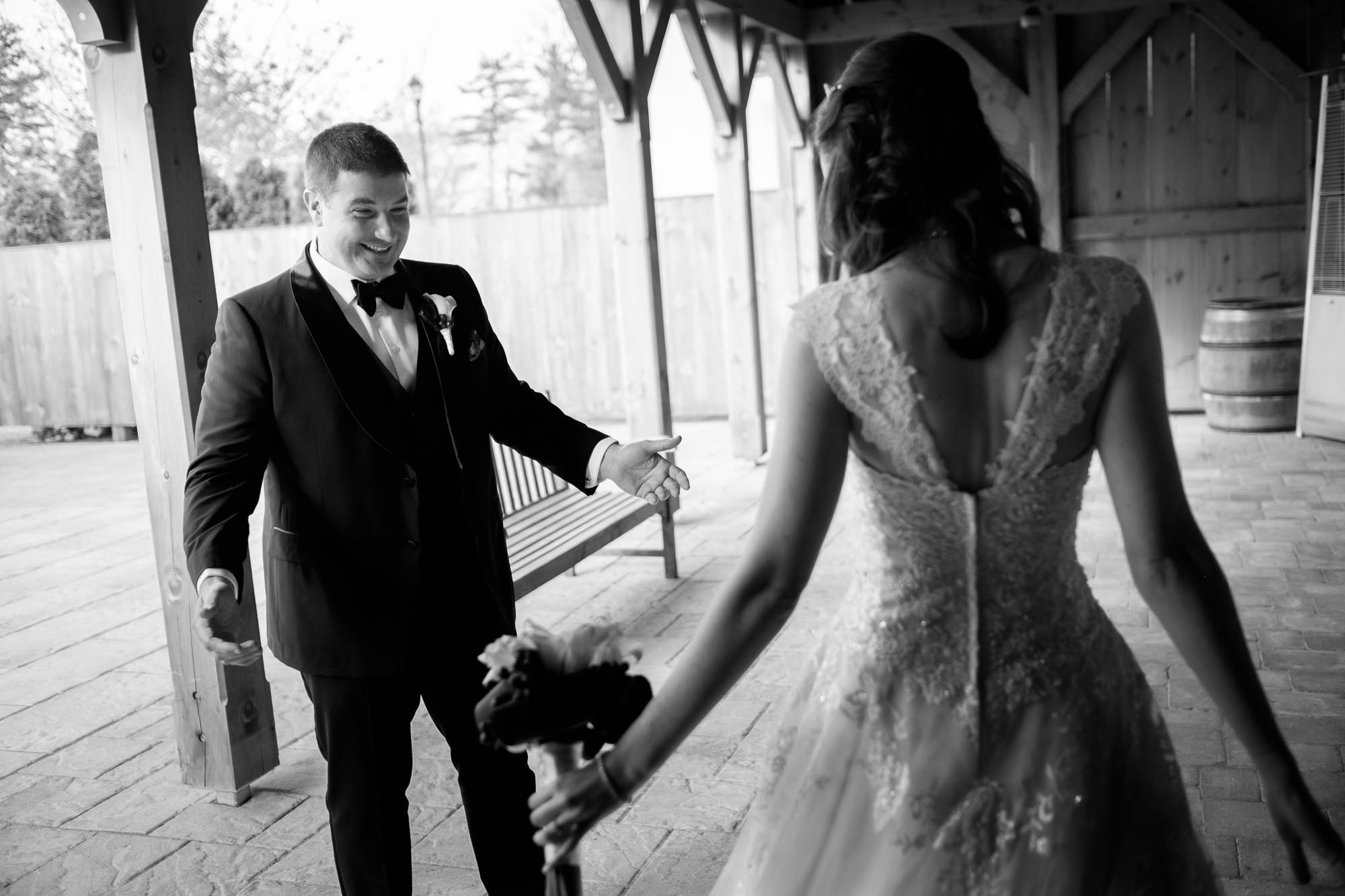  Rob reacts to seeing his bride Amanda for the first time before their wedding ceremony at Langdon Hall. 