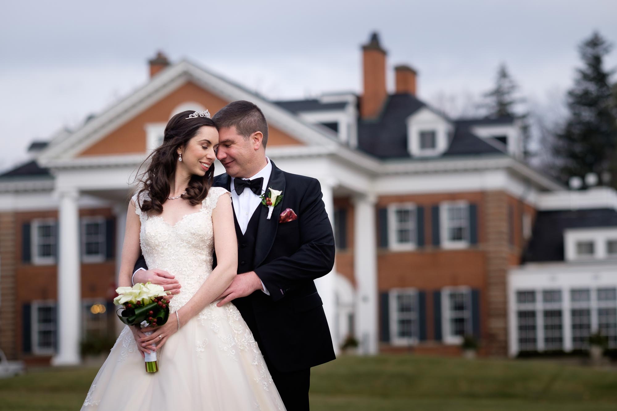 Rob and Amanda pose for a portrait during their wedding at Langdon Hall in Cambridge, Ontario.