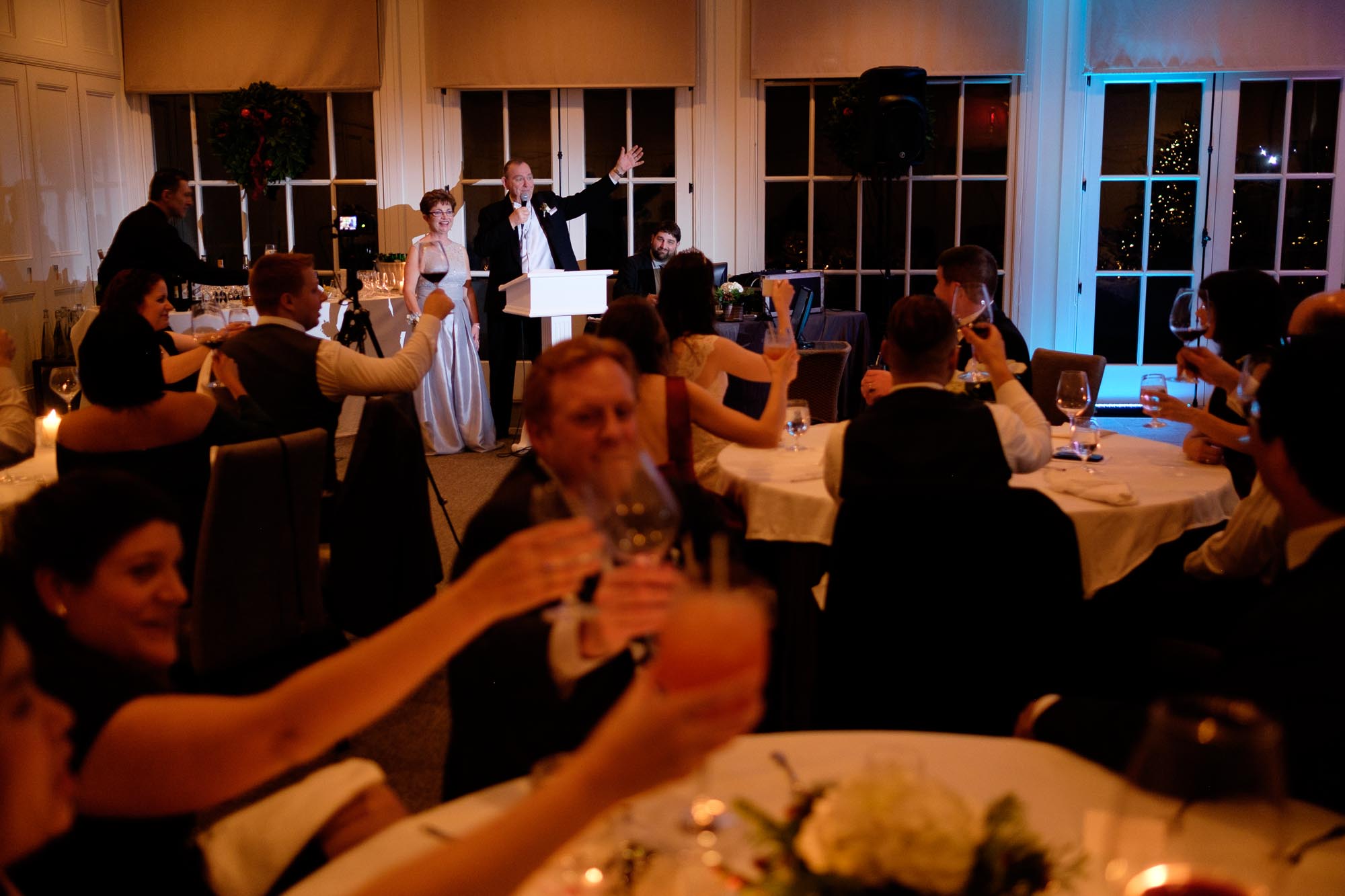 The bride's parents toast the newlywed couple during their wedding reception at Langdon Hall in Cambridge, Ontario.