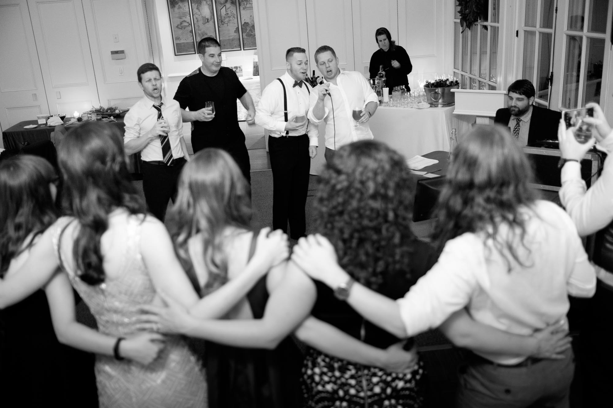  Everyone sings karaoke during Rob &amp; Amanda's wedding reception at Langdon Hall. 