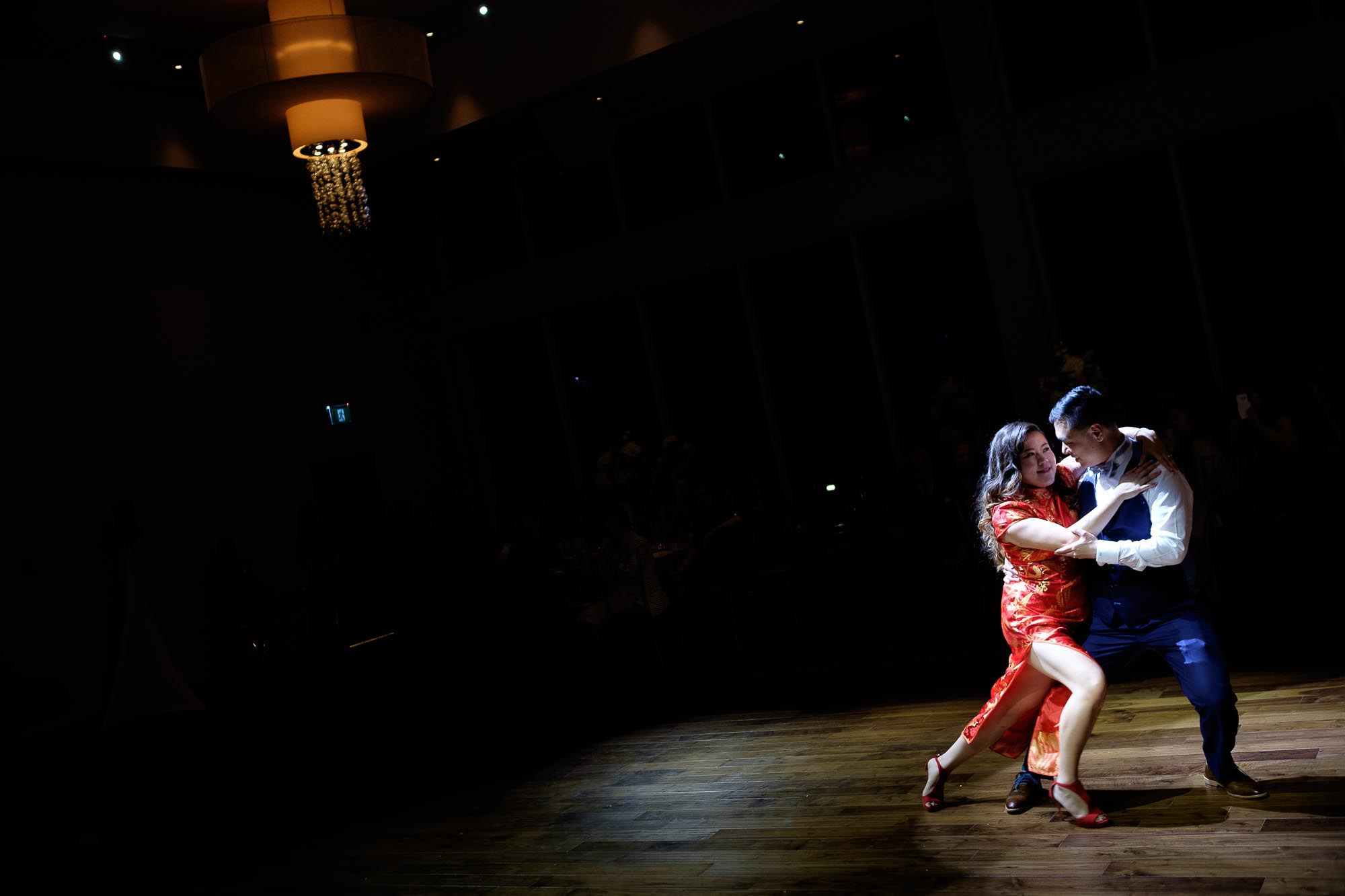 Bride and groom doing a dramatic first dance during their wedding reception at the Guild Inn Estate in Toronto. 