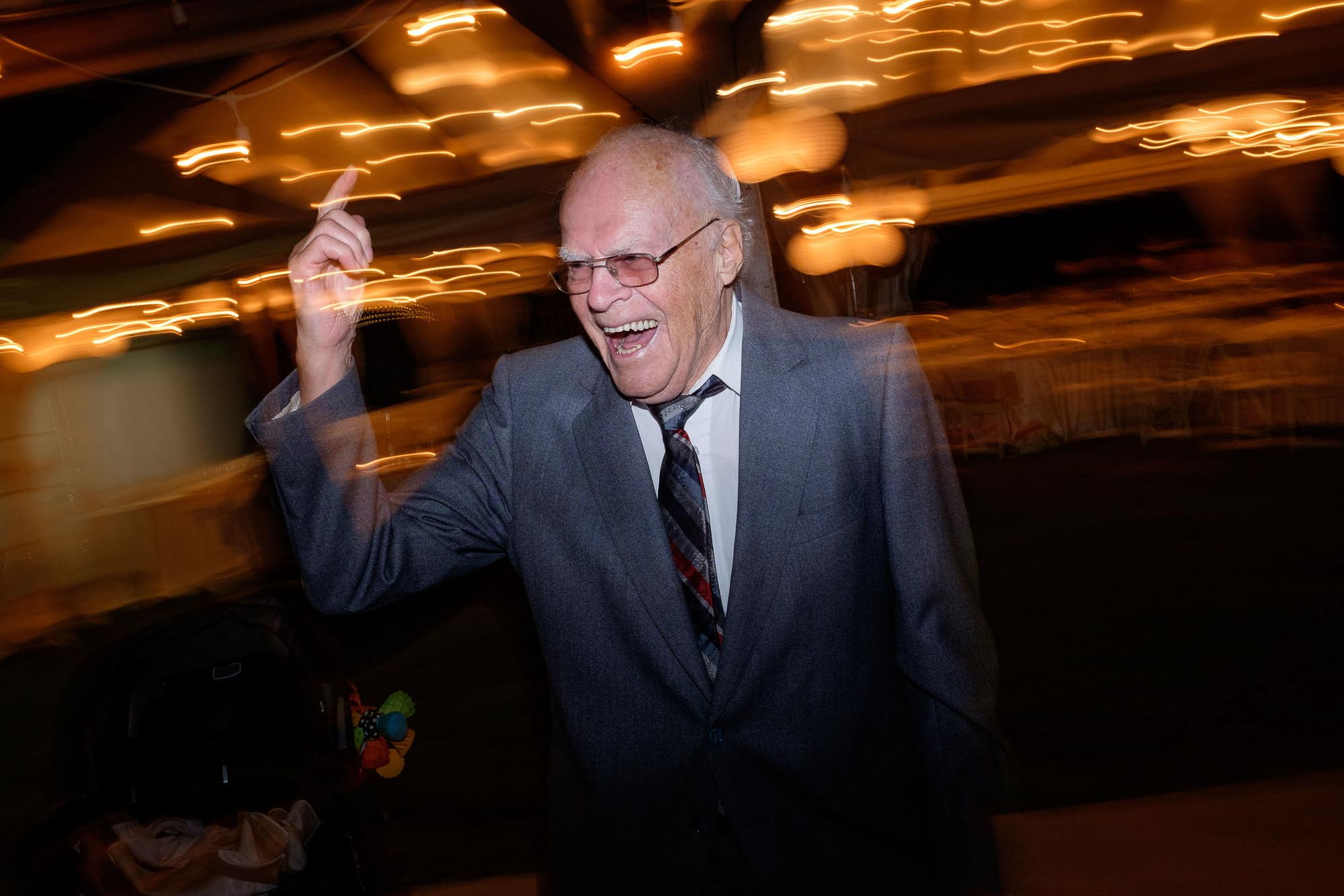  the grandfather hits the dance floor during the wedding reception at the markham museum in Ontario. 