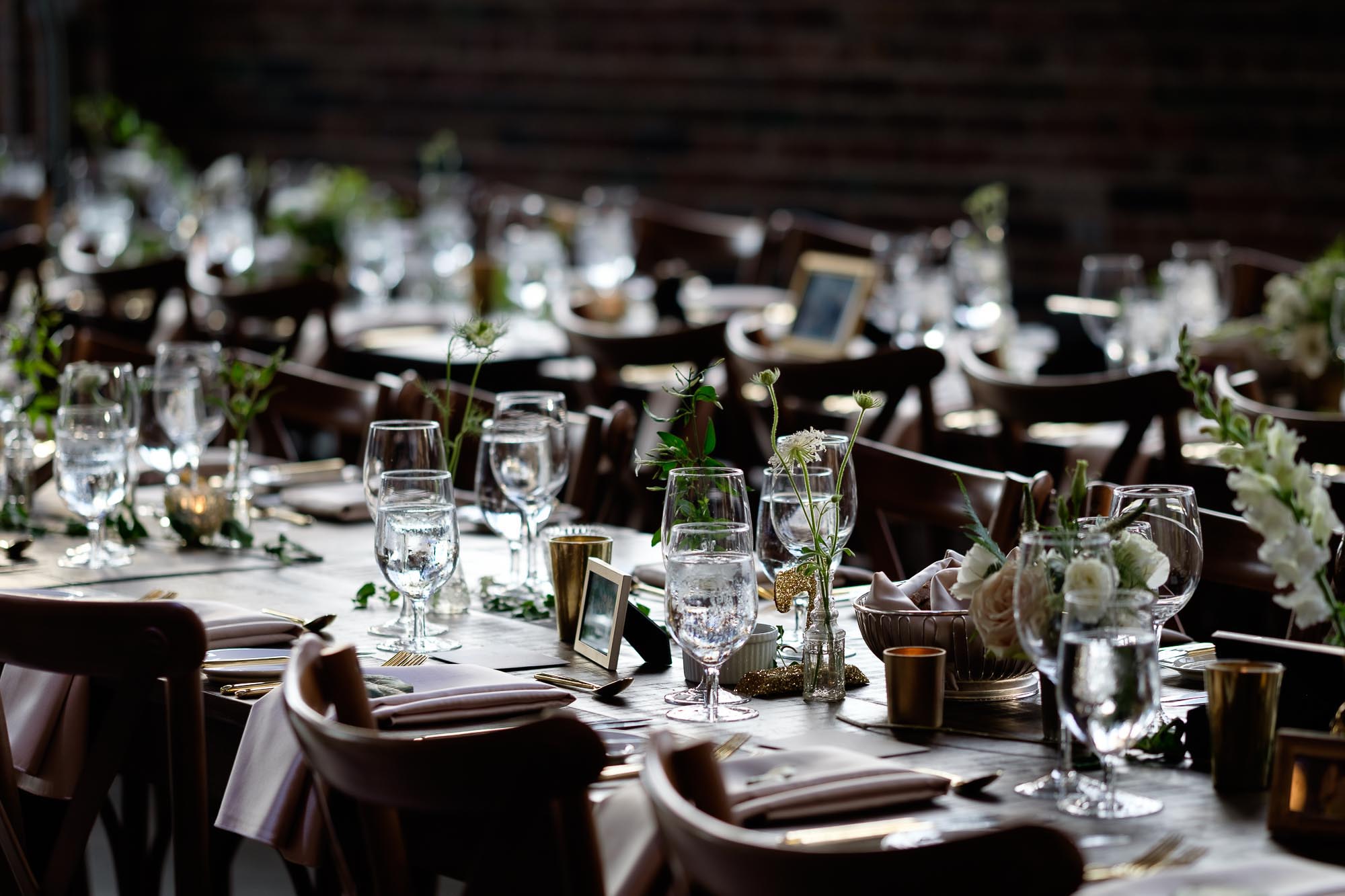  A detail photograph of the table settings from a wedding at SteamWhistle Brewery in downtown Toronto. 