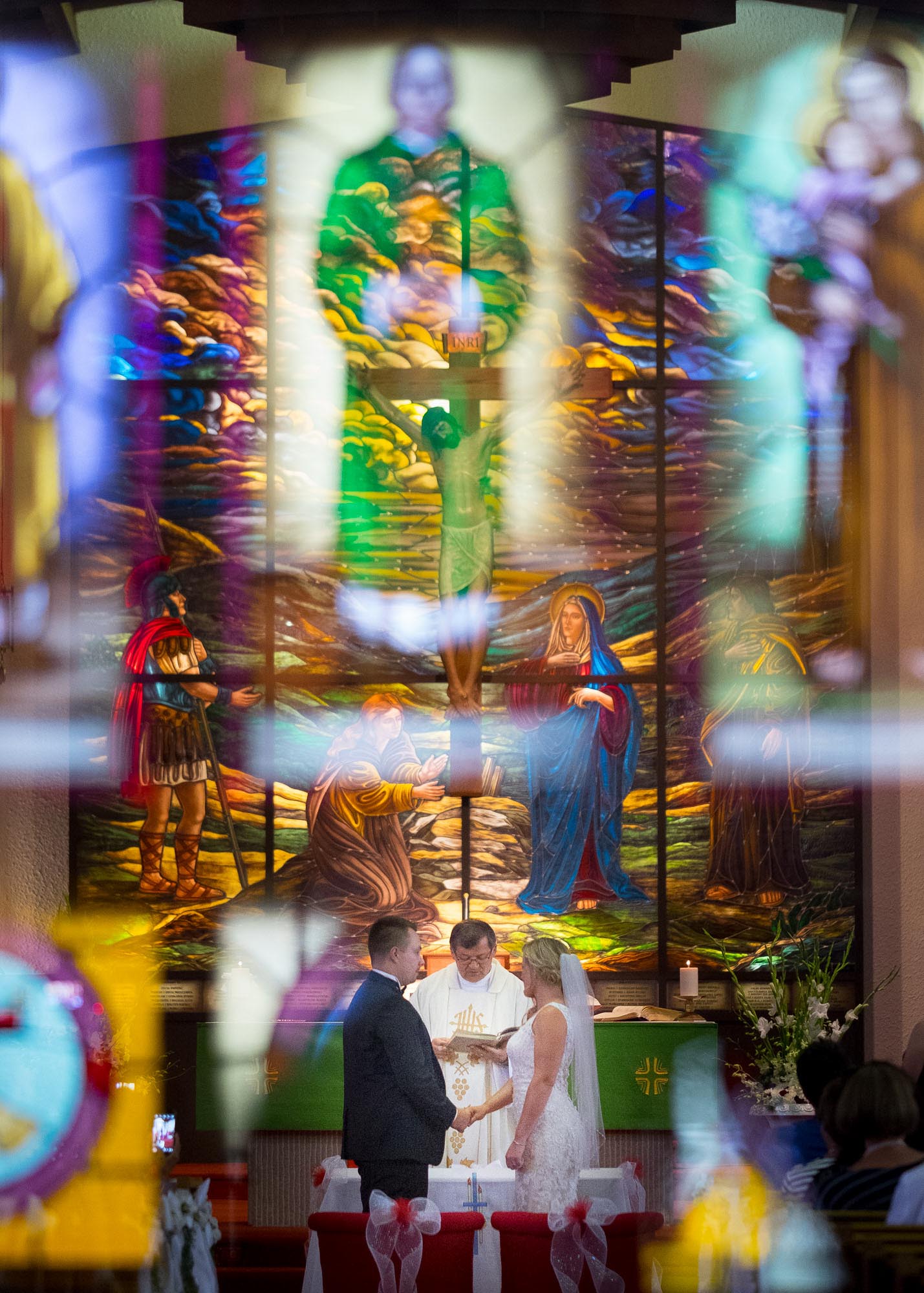  the bride and groom exchange vows during their wedding ceremony in Ontario. 