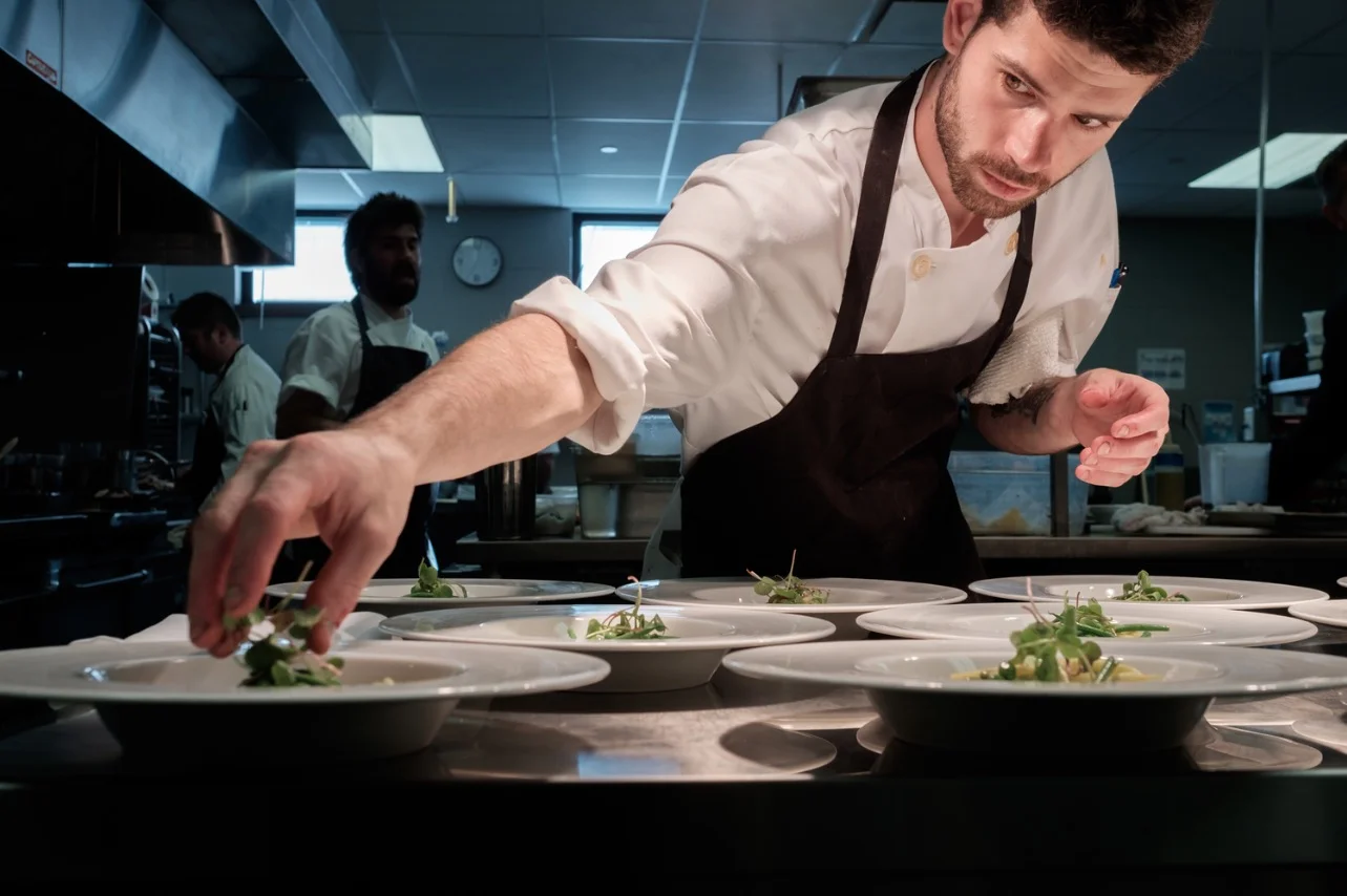  Commercial photograph of a chef in a &nbsp;kitchen by commercial photographer Scott Williams. 