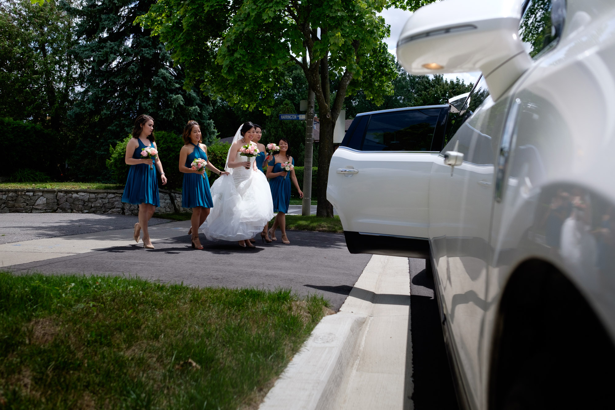  The girls head to the limo to leave for their Roman Catholic wedding ceremony in Toronto.  