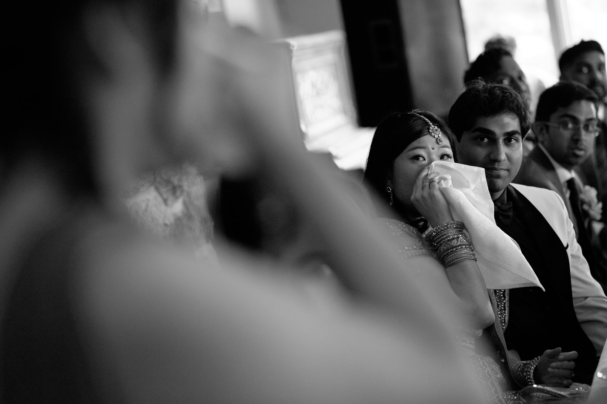 The bride and maid of honour share a tear during her speech at the wedding reception at Waterstone Estate’s in Toronto.