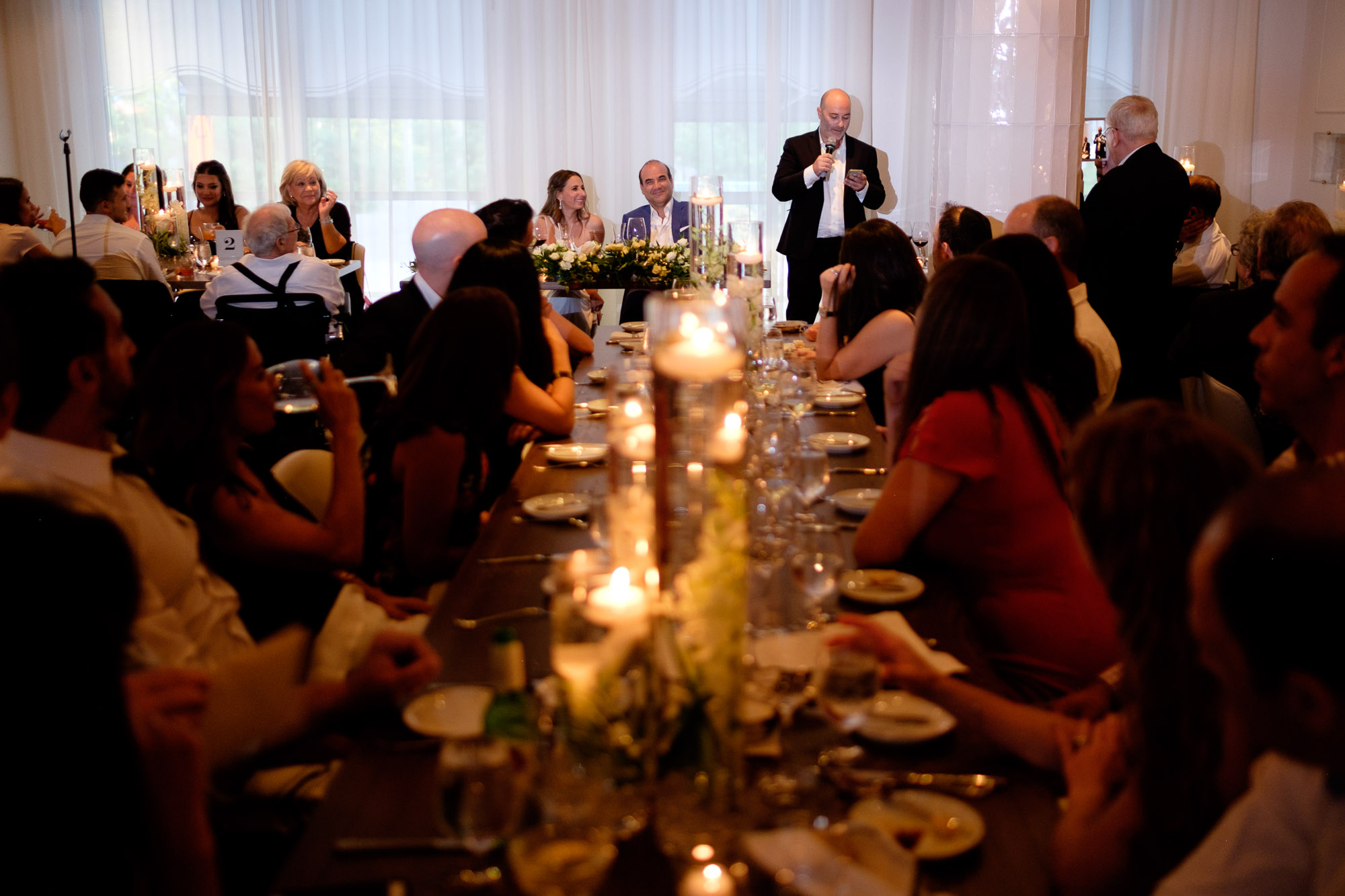  The bride and groom are toasted during their wedding reception at Sassafraz restaurant in Toronto’s Yorkville neighbourhood. 