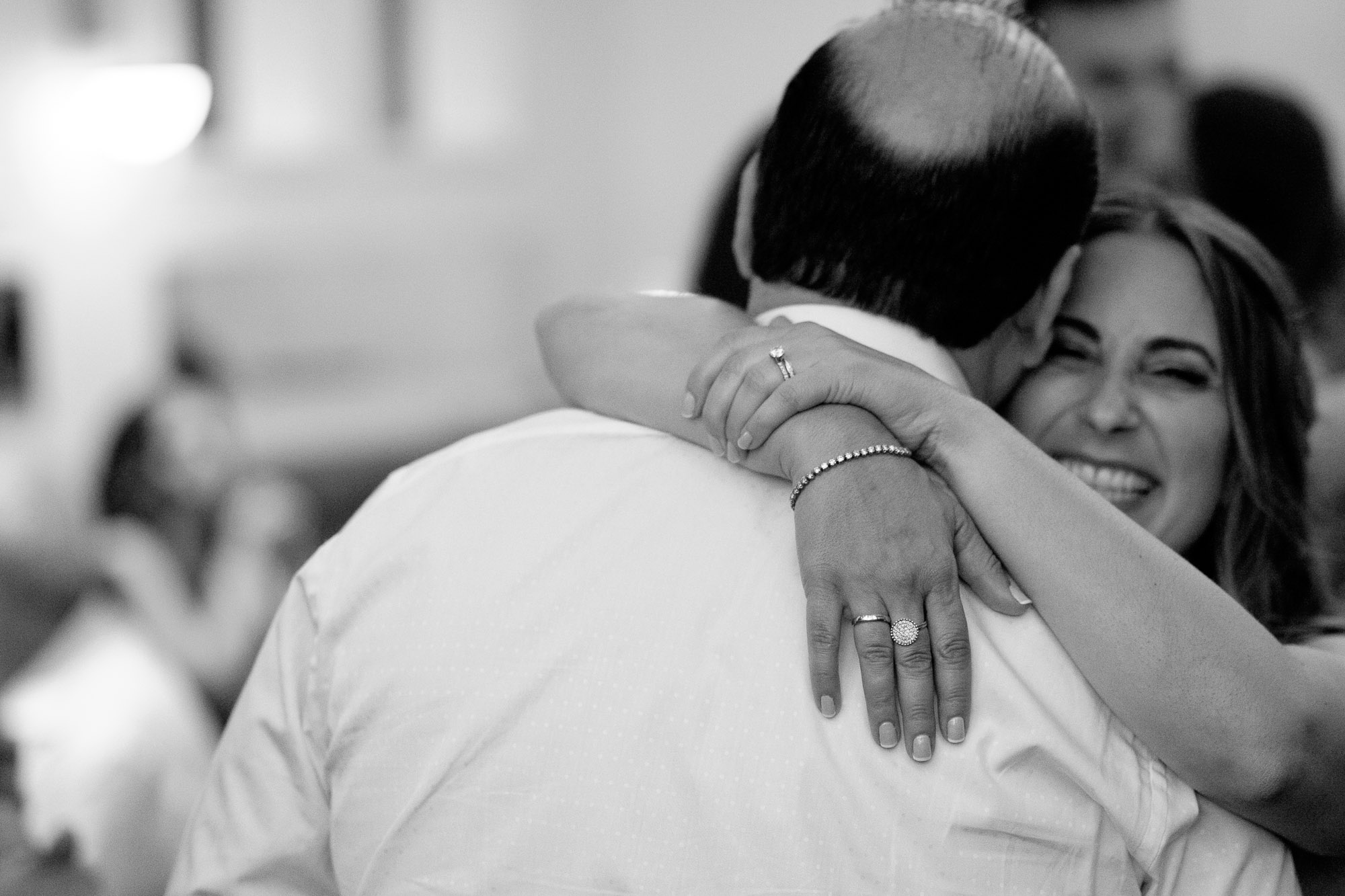  the bride and groom embrace on the dance floor while dancing during their wedding reception at Sassafraz restaurant in Toronto’s Yorkville neighbourhood. 