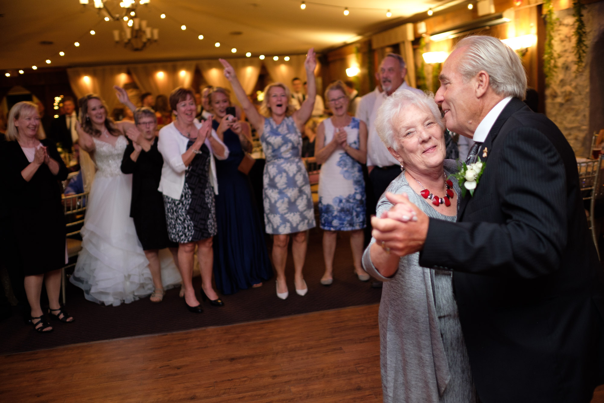 The grandparents of Alex + Colton celebrate their anniversary on the dance floor during the reception at Alex + Colton’s wedding at the Hessenland Inn.