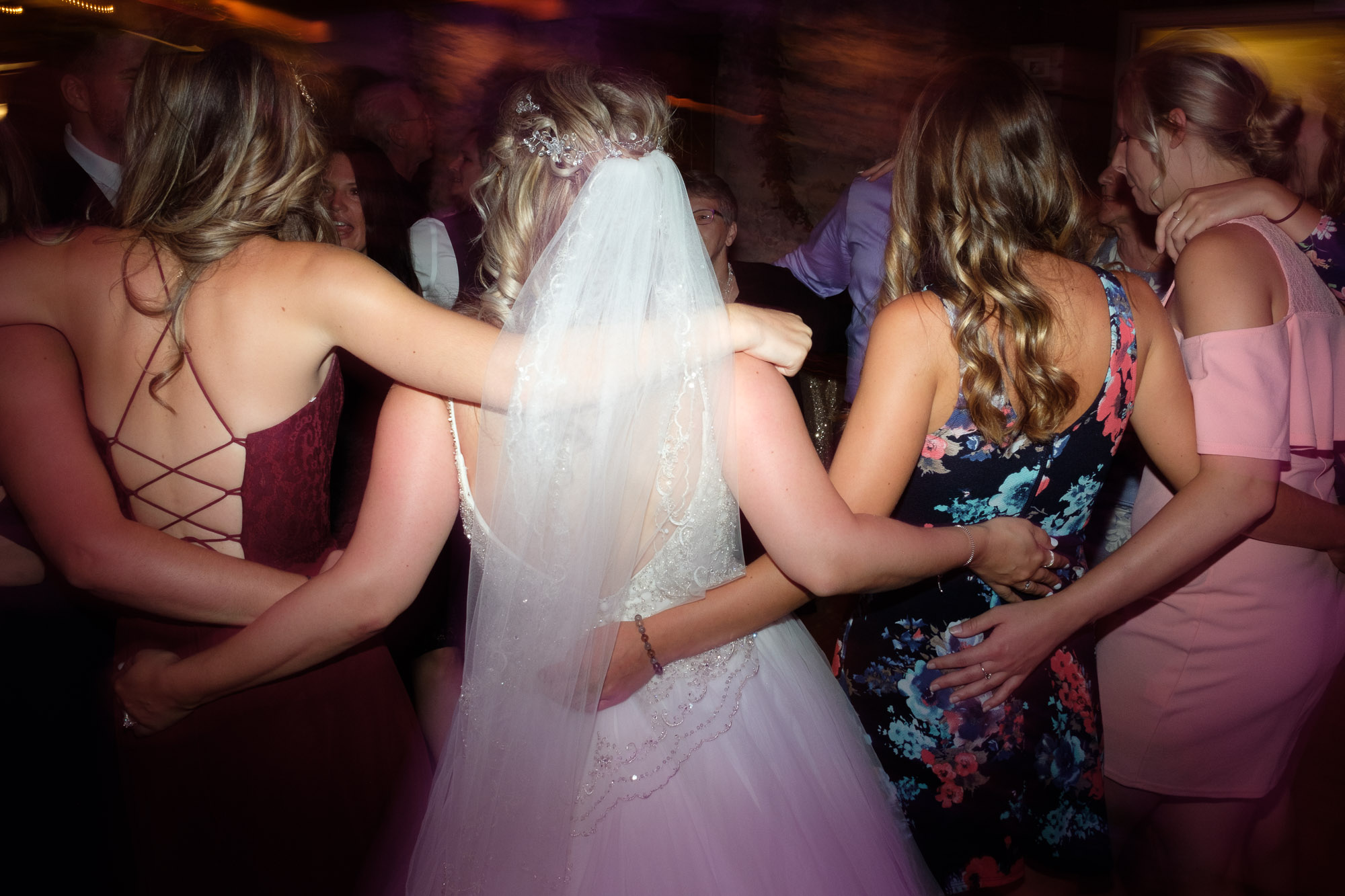  Alex dances with her friends late into the night during her reception at the Hessenland Inn.  