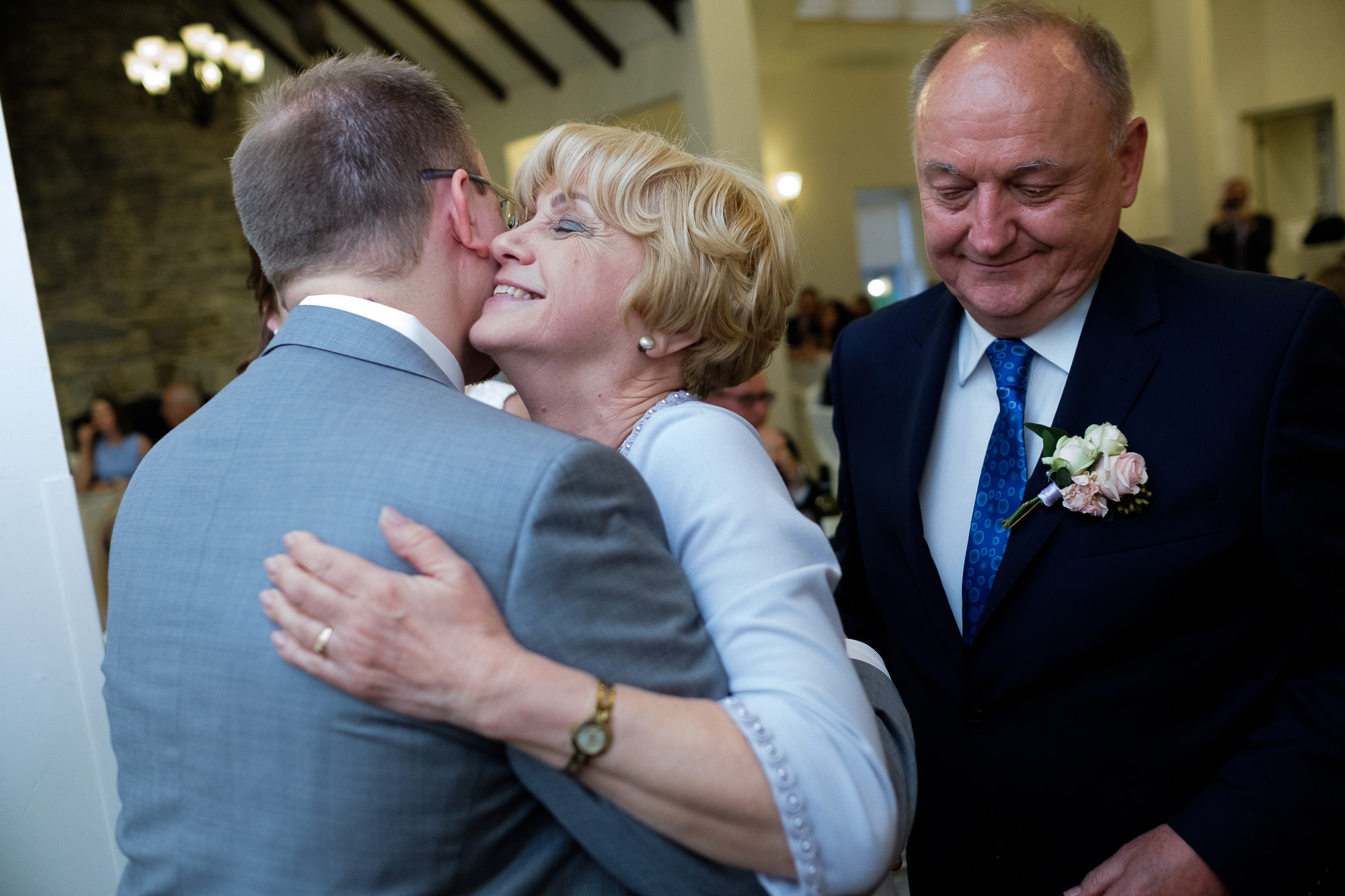  The groom give his mom a hug after her wedding toast during the wedding reception at the Glenerin Inn outside of Toronto 