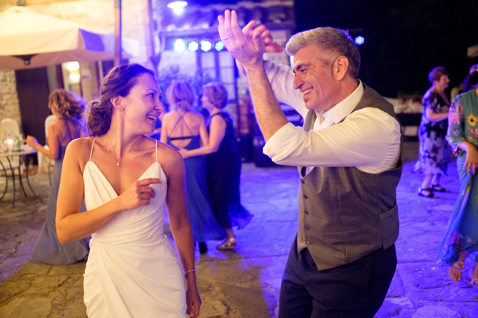  Elena +  Steve party into the night during their wedding reception at a villa in Tuscany, Italy during their destination wedding by wedding photographer Scott Williams (www.scottwilliamsphotographer.com) 