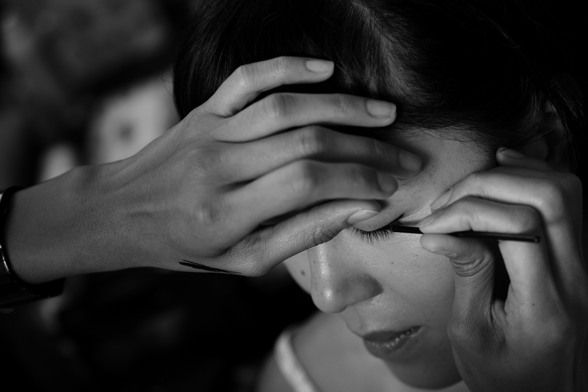  Huong has her makeup applied while getting ready at the grooms family home in North York before the wedding ceremony at St Gabriel’s Parish in Toronto. 