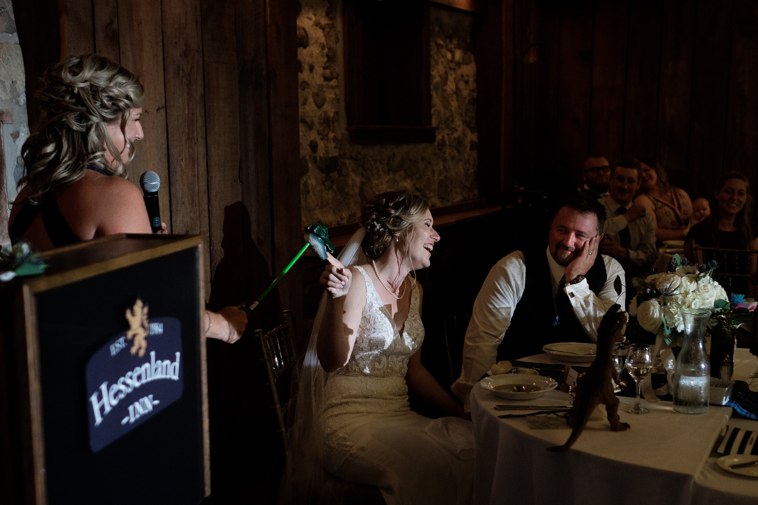  Amanda and Chad are toasted by Amanda’s sister during their wedding reception at the Hessenland Country Inn by Toronto wedding photographer Scott Williams 