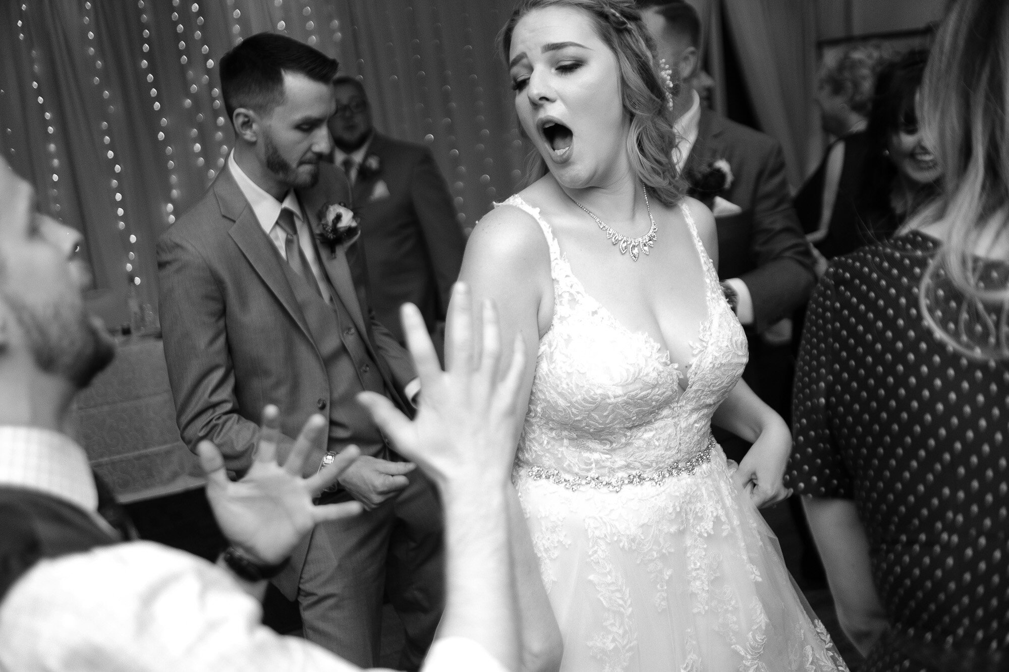  The bride cuts loose on the dance floor during the wedding reception at the Three Bridges event centre located outside of Waterloo, Ontario. Photograph by Toronto wedding photographer Scott Williams. 