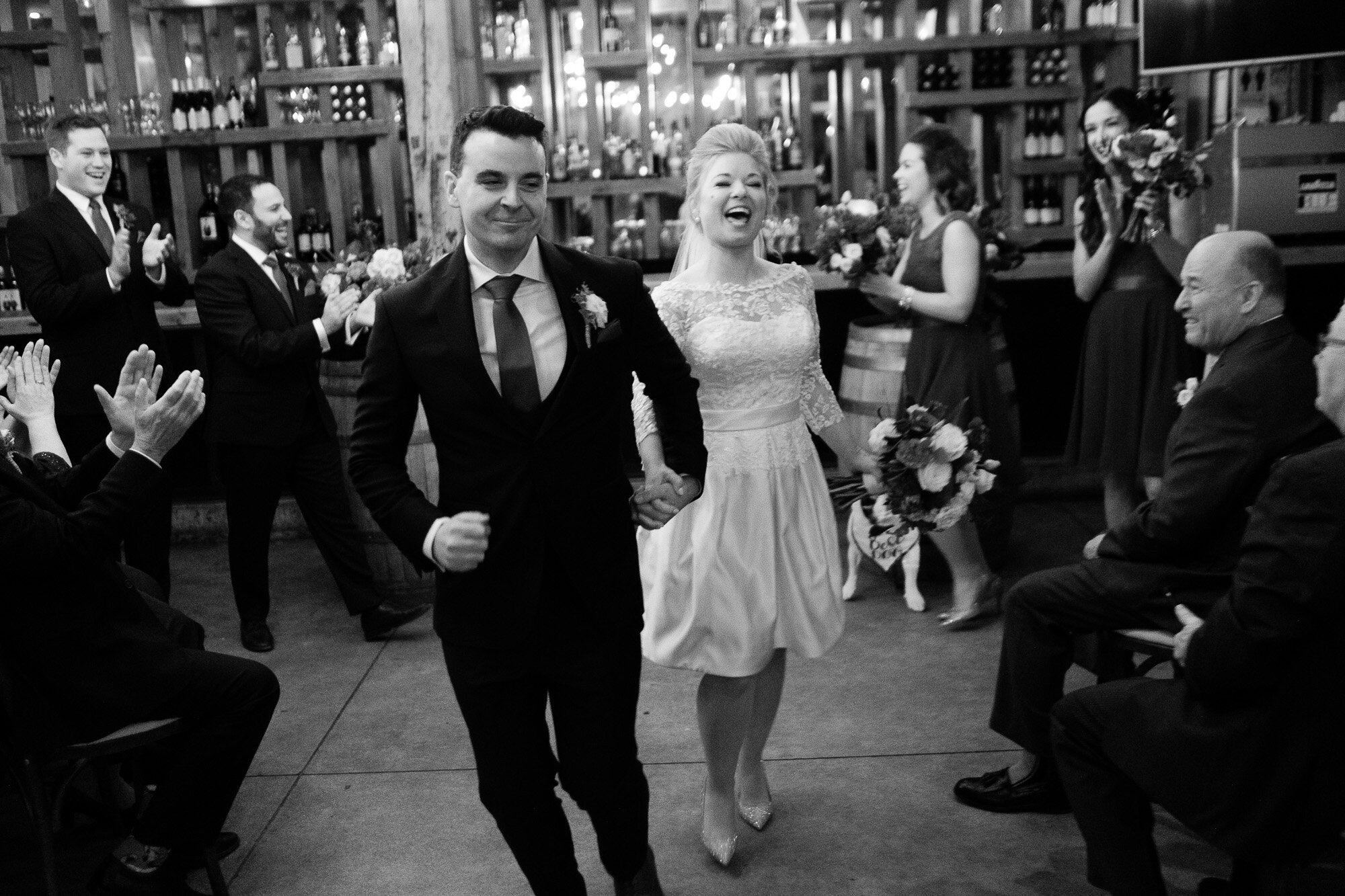  Emily and Aaron dance their way up the aisle after their wedding at Archeo in Toronto’s Distillery district by Toronto Wedding Photographer Scott Williams. 