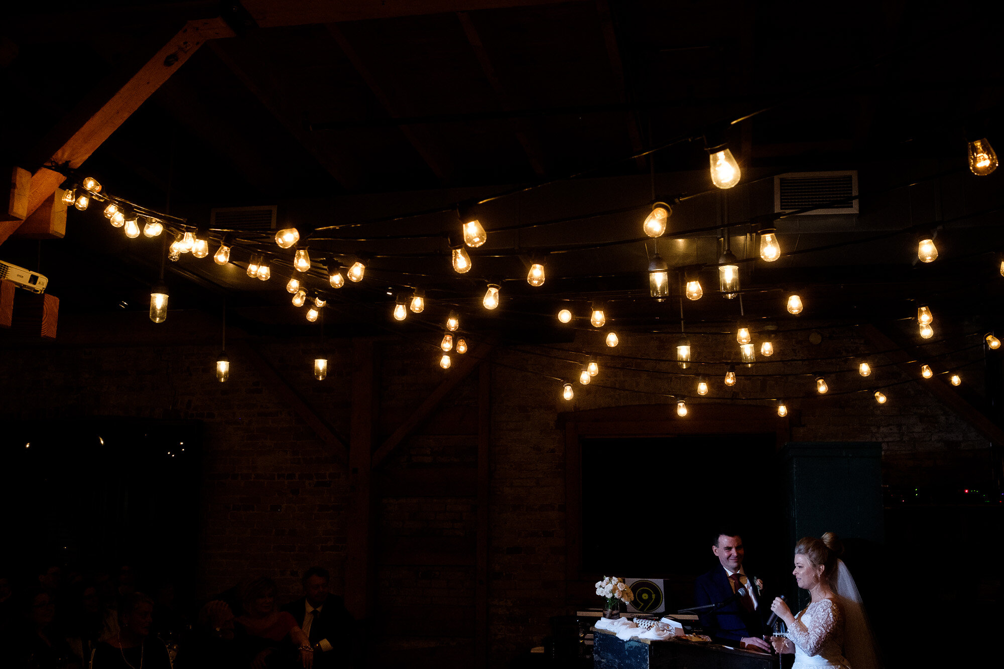  Emily and Aaron make their thank you’s during  their wedding reception at Archeo in Toronto’s Distillery district by Toronto Wedding Photographer Scott Williams. 