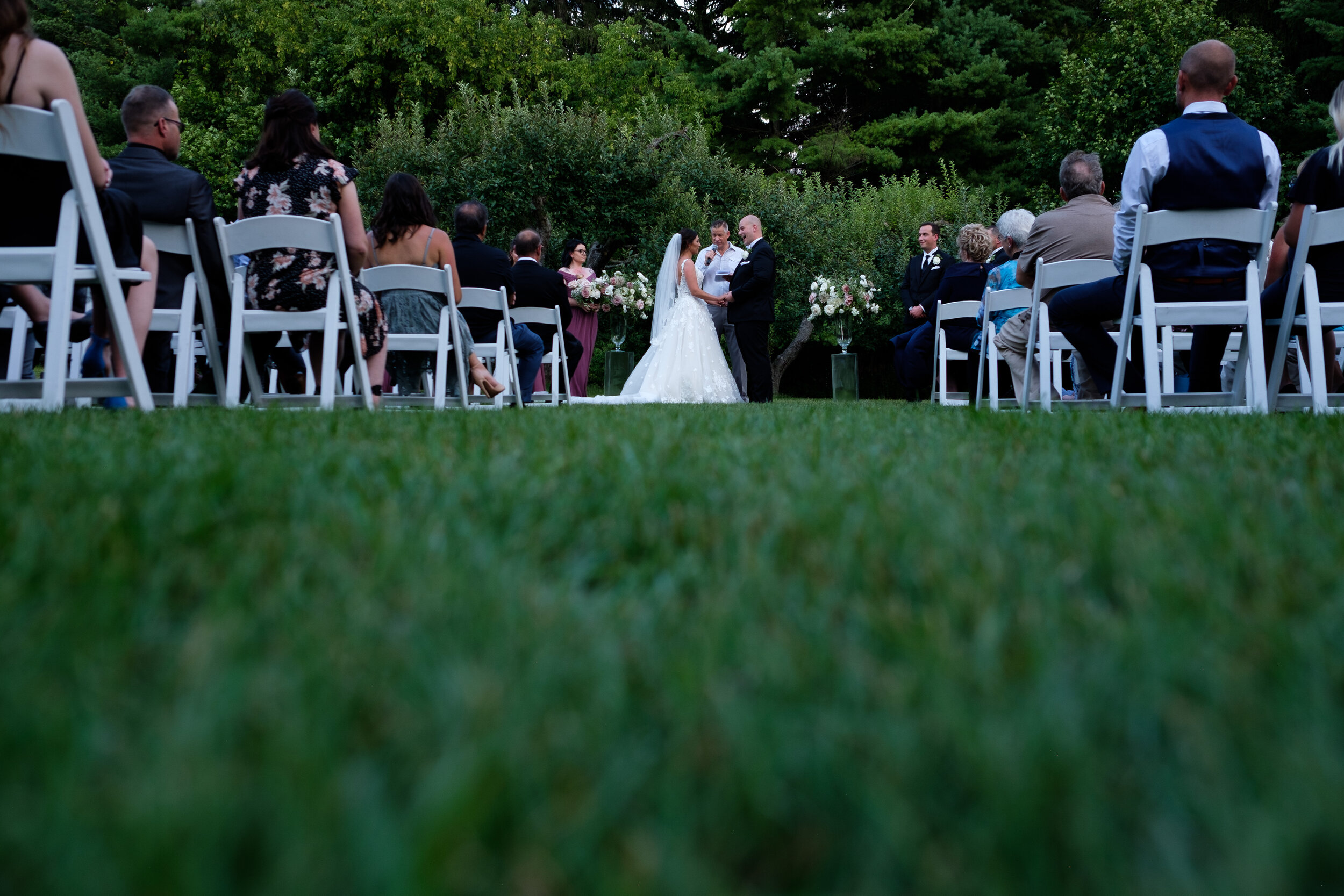  A color wedding photograph of Elizabeth and Stephen during during their outdoor wedding at Langdon Hall in Cambridge, Ontario by Toronto wedding photographer Scott Williams (www.scottwilliamsphotogrpaher.com) 