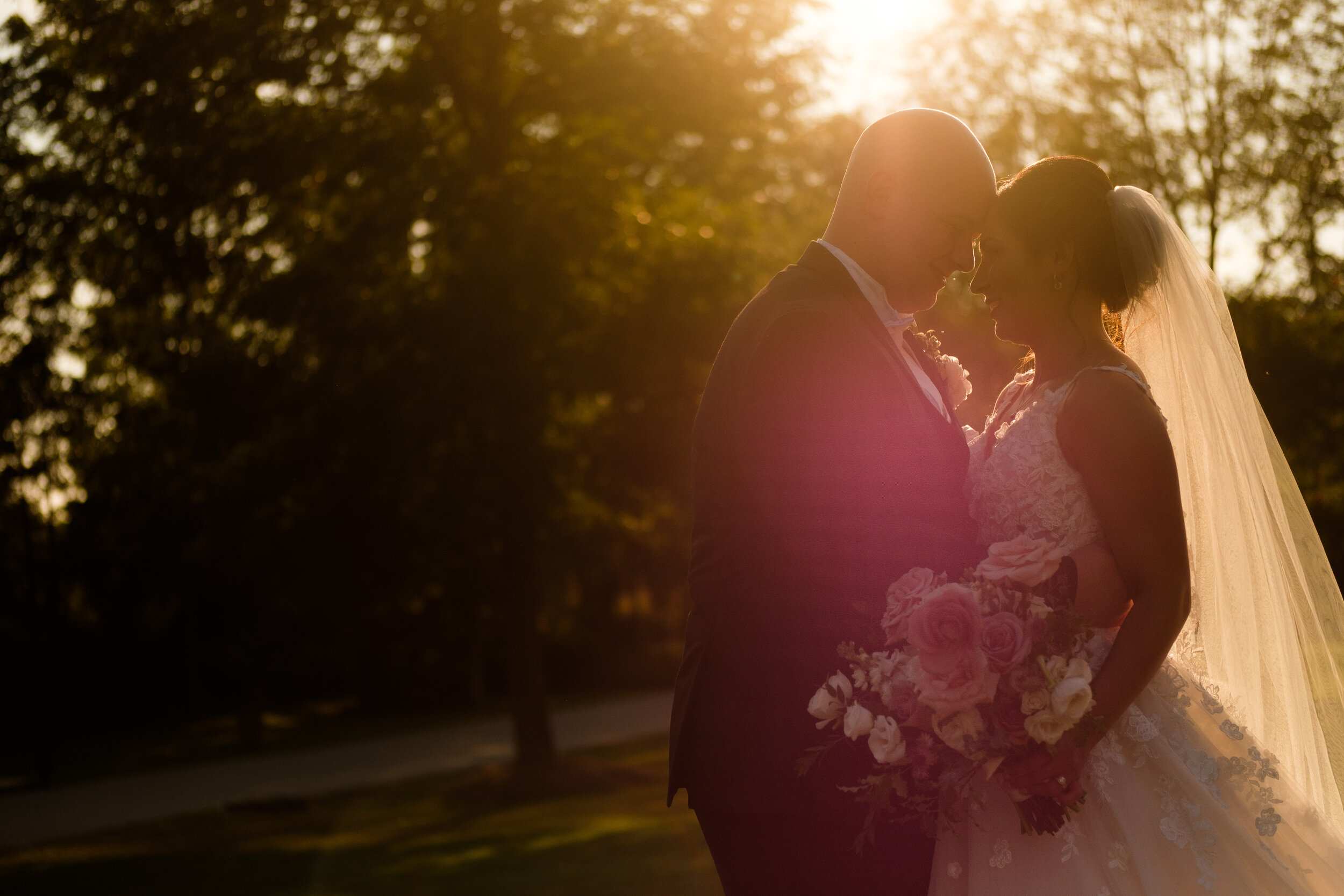  A colour wedding portrait photograph of Elizabeth and Stephen at golden hour during their  outdoor wedding at Langdon Hall in Cambridge, Ontario by Toronto wedding photographer Scott Williams (www.scottwilliamsphotogrpaher.com) 