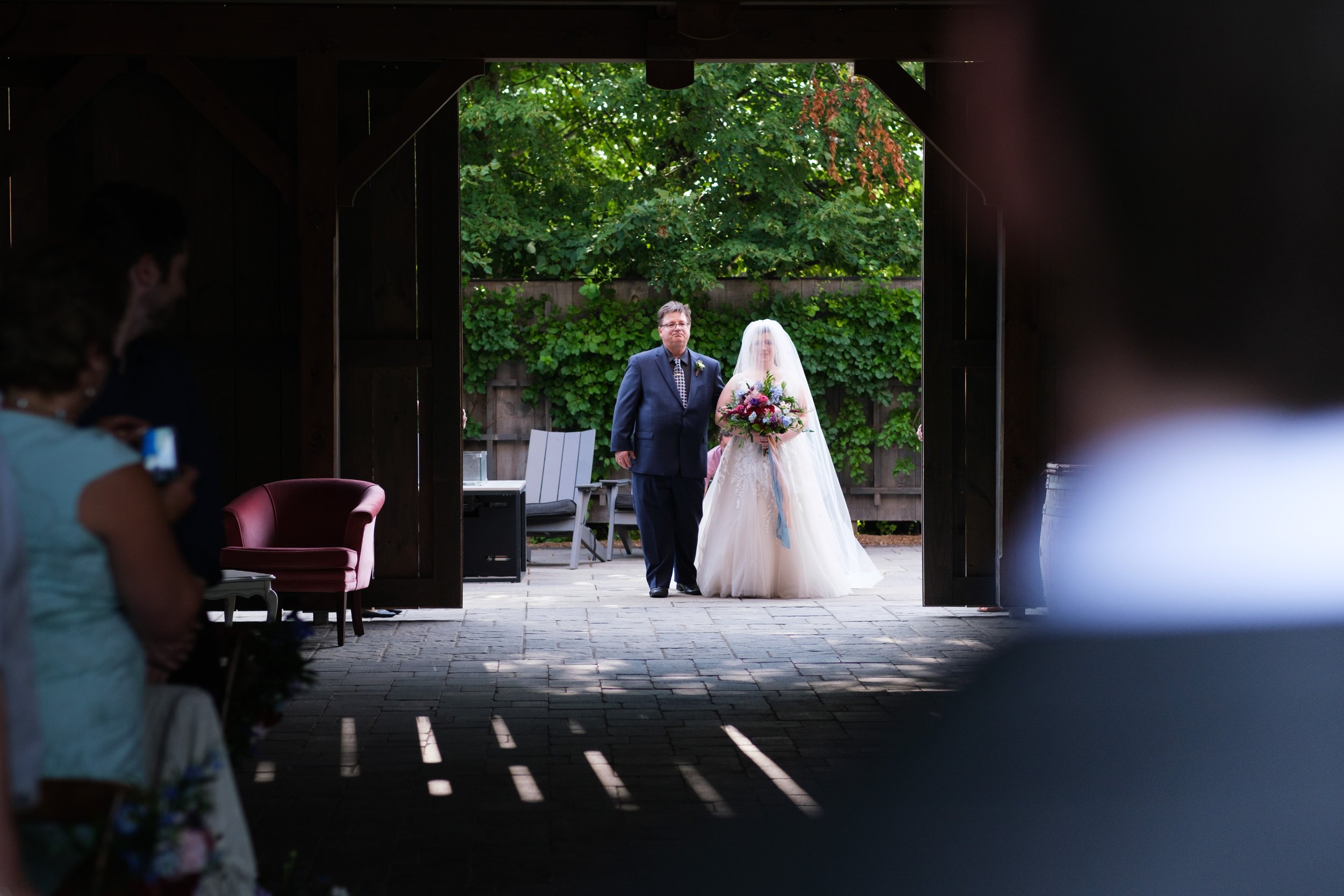  A colour wedding candid photograph from Veronica + Brandon’s wedding ceremony at Langdon Hall in Cambridge, Ontario by Toronto Wedding photographer Scott Williams (www.scottwilliamsphotographer.com) 