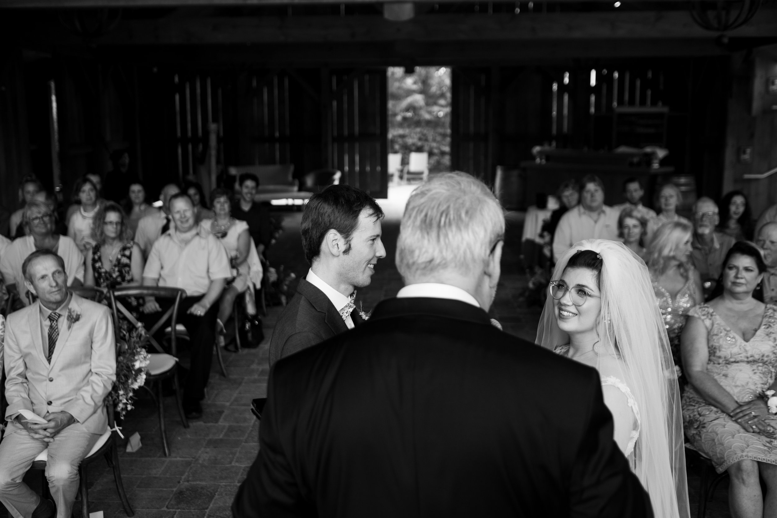  A black and white candid wedding photograph from Veronica + Brandon’s wedding at Langdon Hall in Cambridge, Ontario by Toronto Wedding photographer Scott Williams (www.scottwilliamsphotographer.com) 