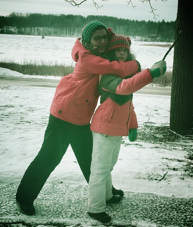 B and C playing around on ice.