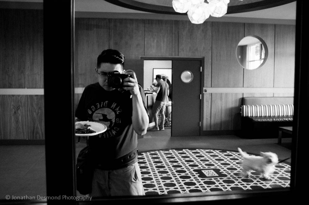 OK, no dancing here. I was on a personal photography assignment for a friend's going-away party and snapped this. And yes, food in hand while doing it... I saw the dog starting to walk out of the frame so let the camera blur it's movement in order to keep it in.