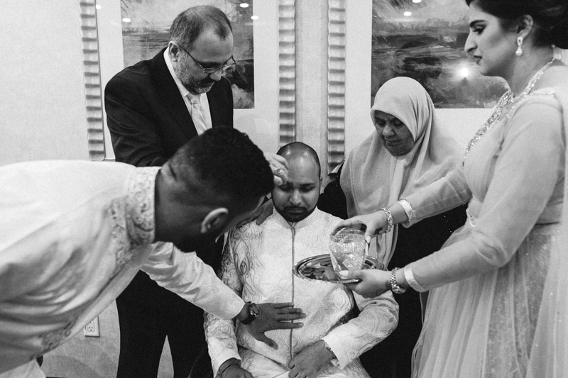 There were a lot of moments at Irfan and Sajeda's wedding. While seconding for Jody Nay Photography, I caught this moment during a Muslim ceremony that had a lot happening but really brought together many elements of the situation in one photograph.