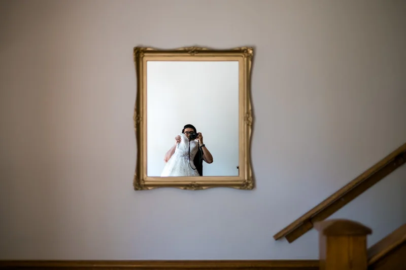 That time I ran around with the bride's dress... yes, I was looking for a place to hang it for primary photog Jody Wiger.