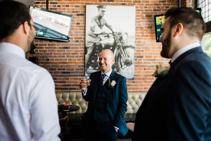 The groom and his groomsmen spent a bit of time hanging out at the pub next door to Brix and Mortar.