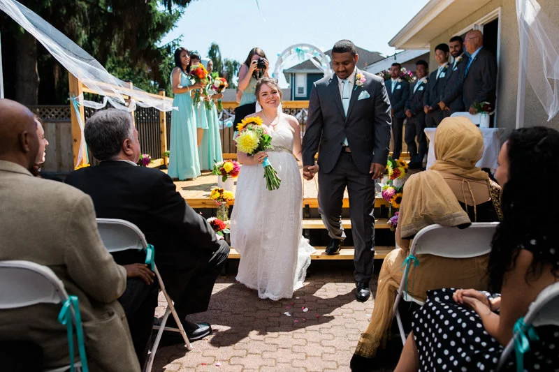 I loved how this wedding was so very small but very intimate and personal. It took place in a backyard! That's Stefanie Cepeda in the background with the camera.