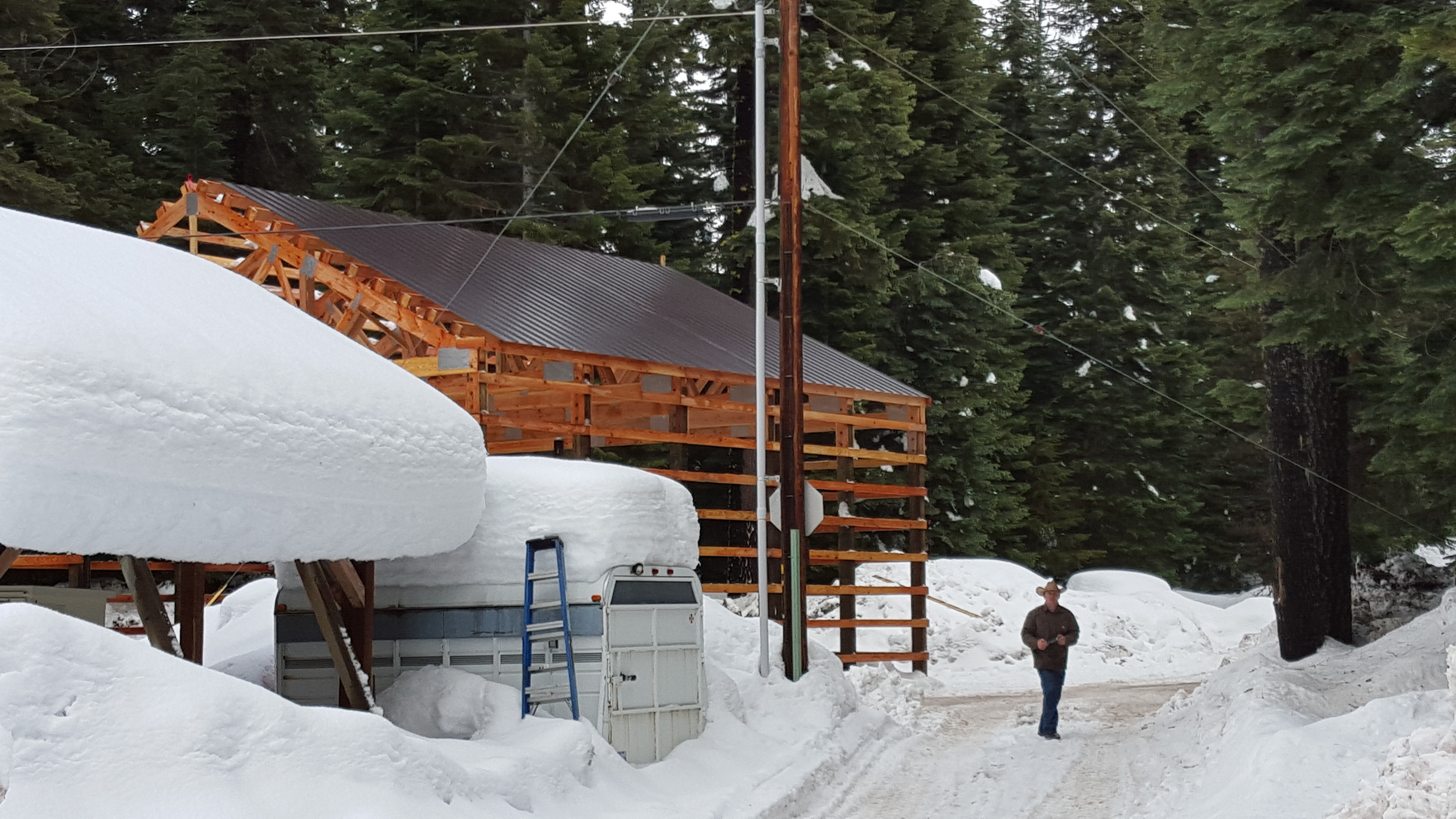 Working through the deep snow to soon complete the snowcat shelter. January 2016