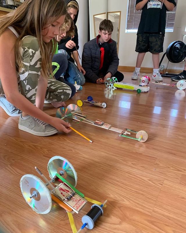 Simple machines making work a little less hard this week at TMS! This unit, students have been getting ready to build medieval trebuchets by exploring how to create mousetrap cars and learning about how simple machines impact our lives. Each team has