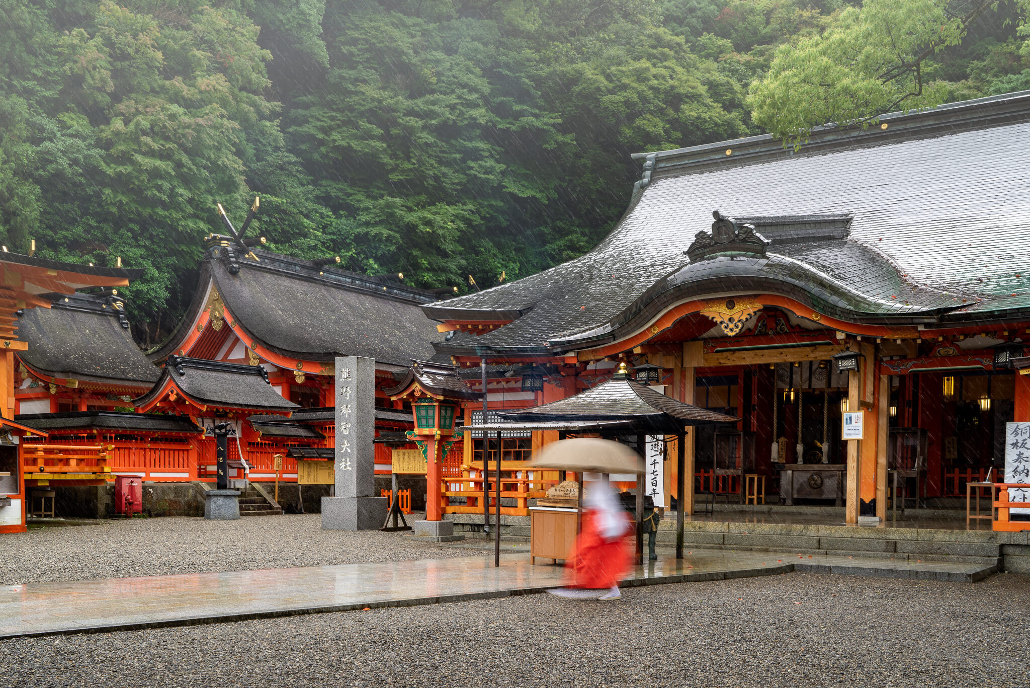 Woman Walking At Kumano Nachi Taisha Temple In The Rain