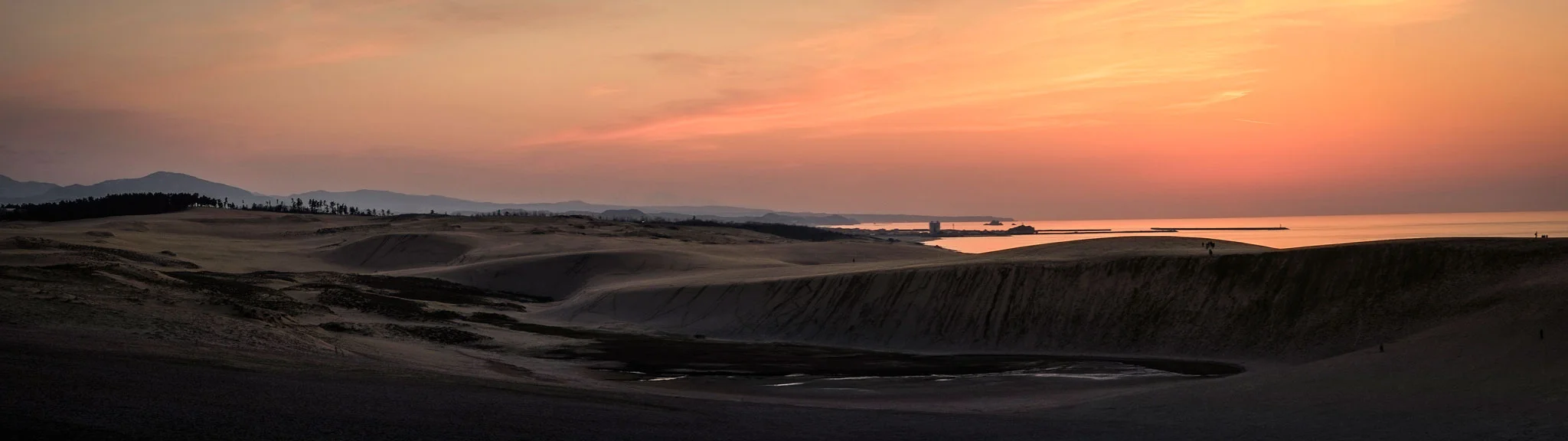 The sunset of the Tottori desert dunes. (In camera panorama) 