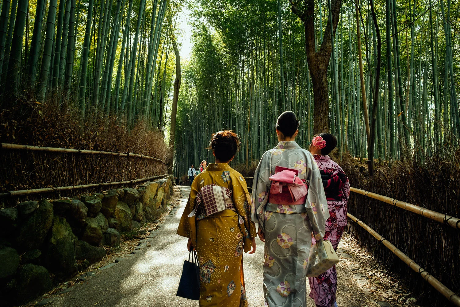Some girls in kimonos strolling around Arashiyama