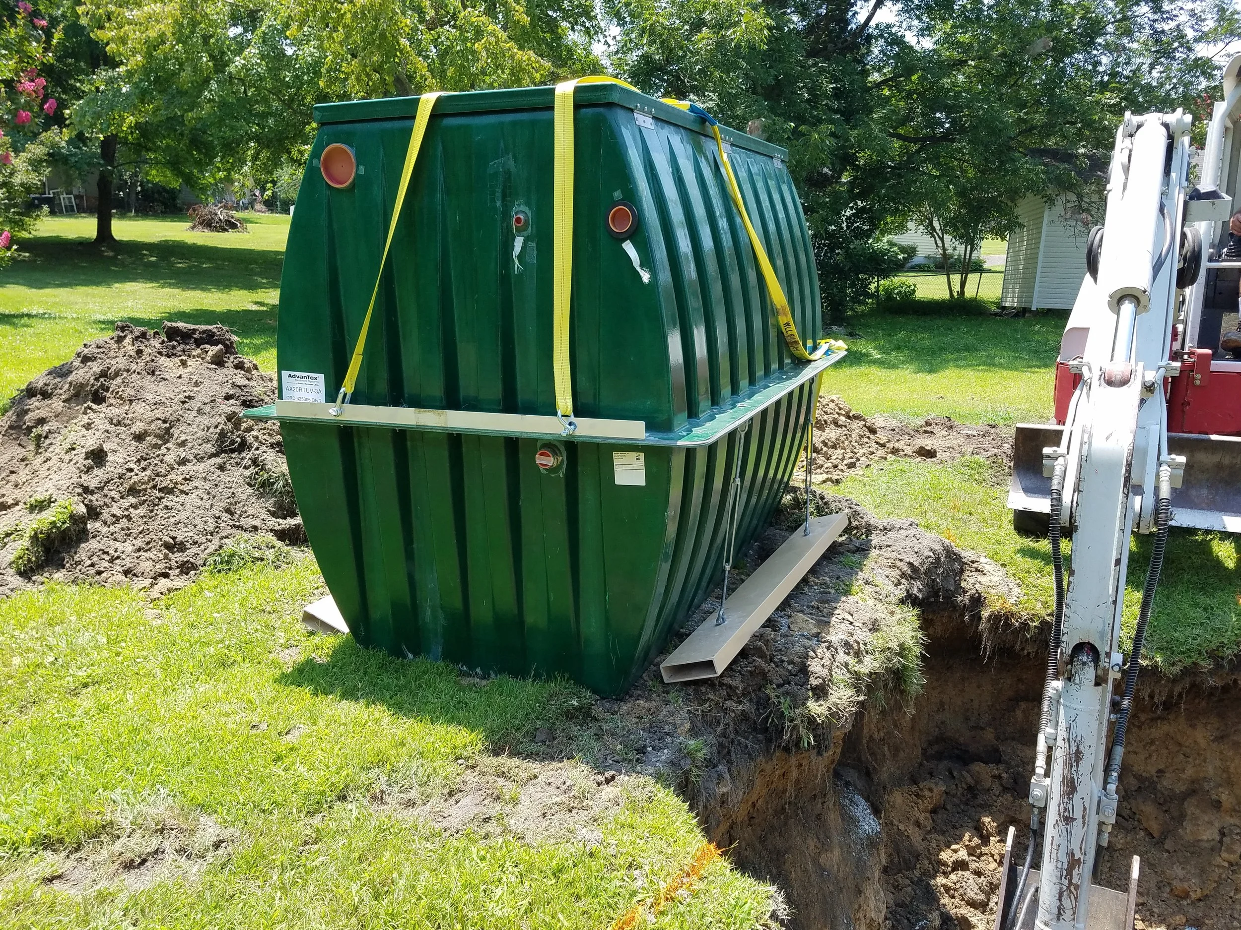AX20RT with UV being installed at a home with a failing sand filter system in Durham. This unit discharged into a small stream behind the property. Easy to install, design, and maintain.