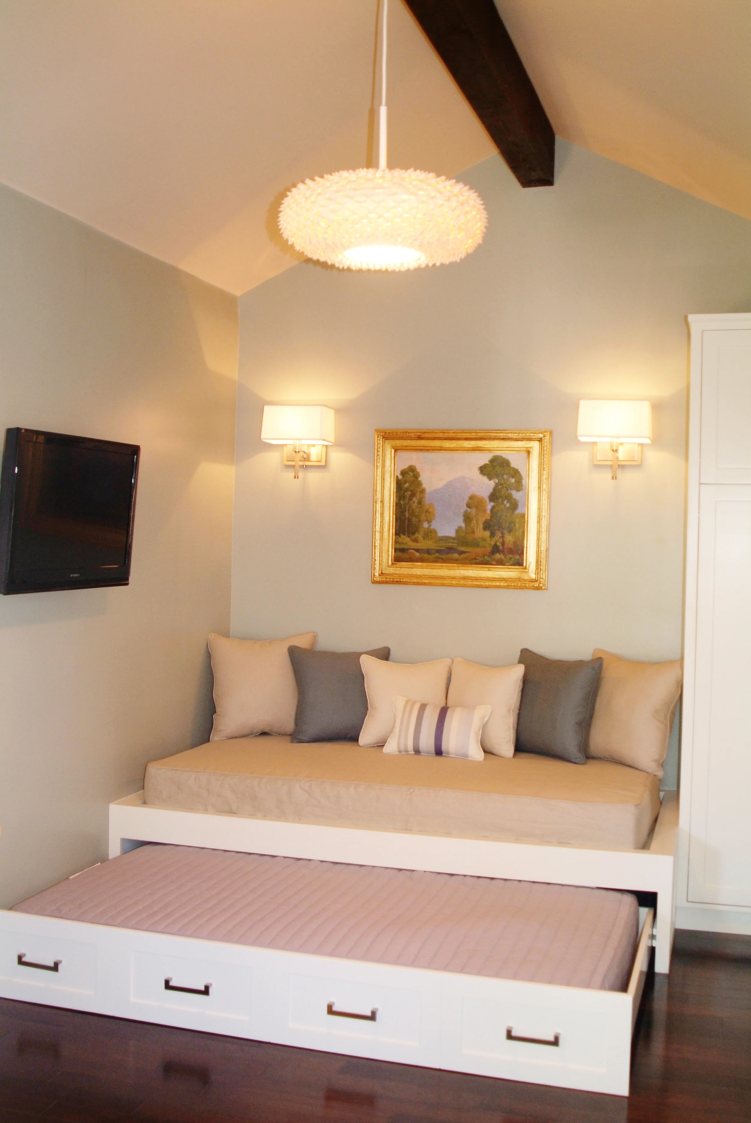 Guest house with custom built in pull out day bed & cabinetry