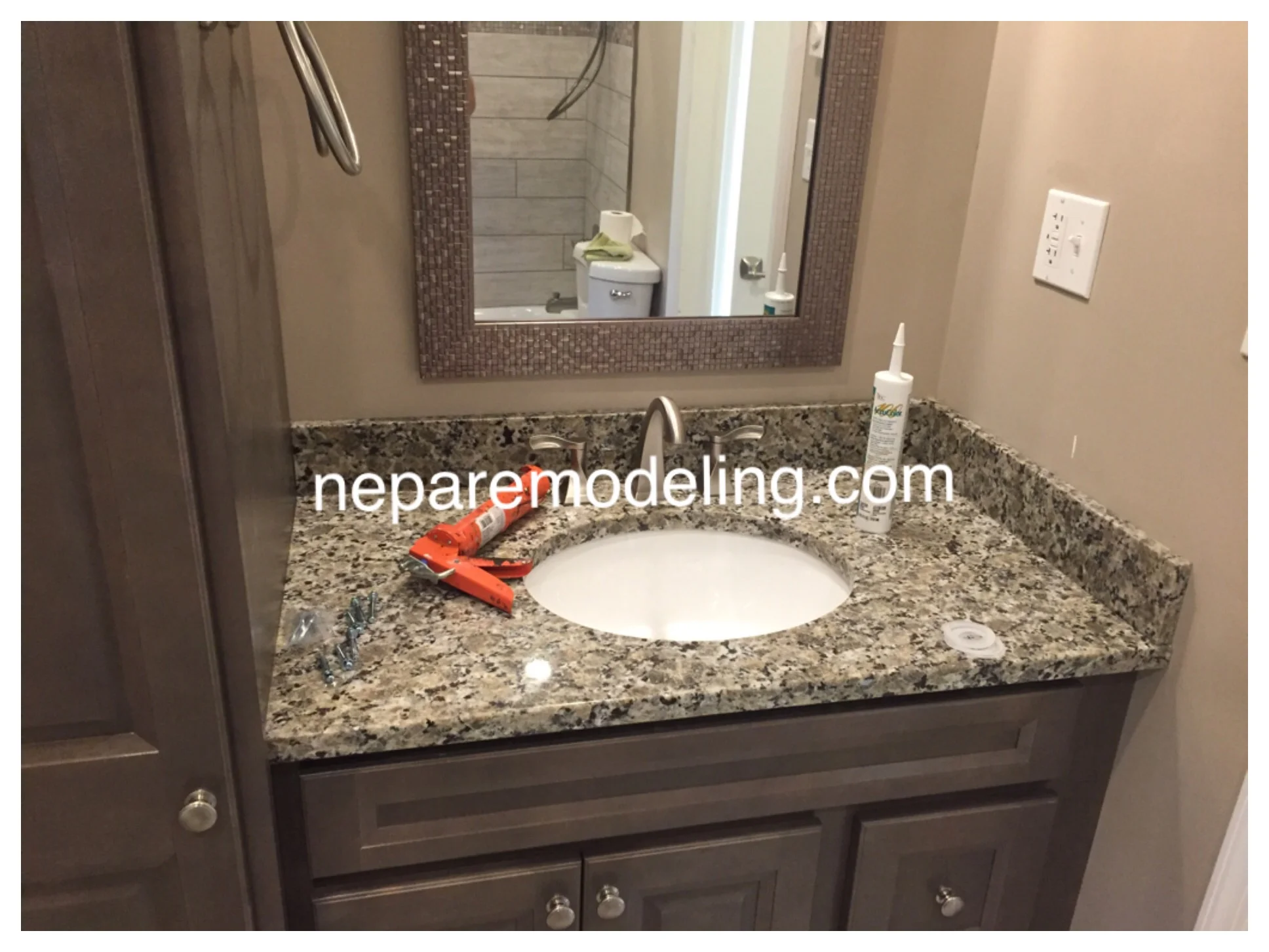 Granite counter with undermount sink.