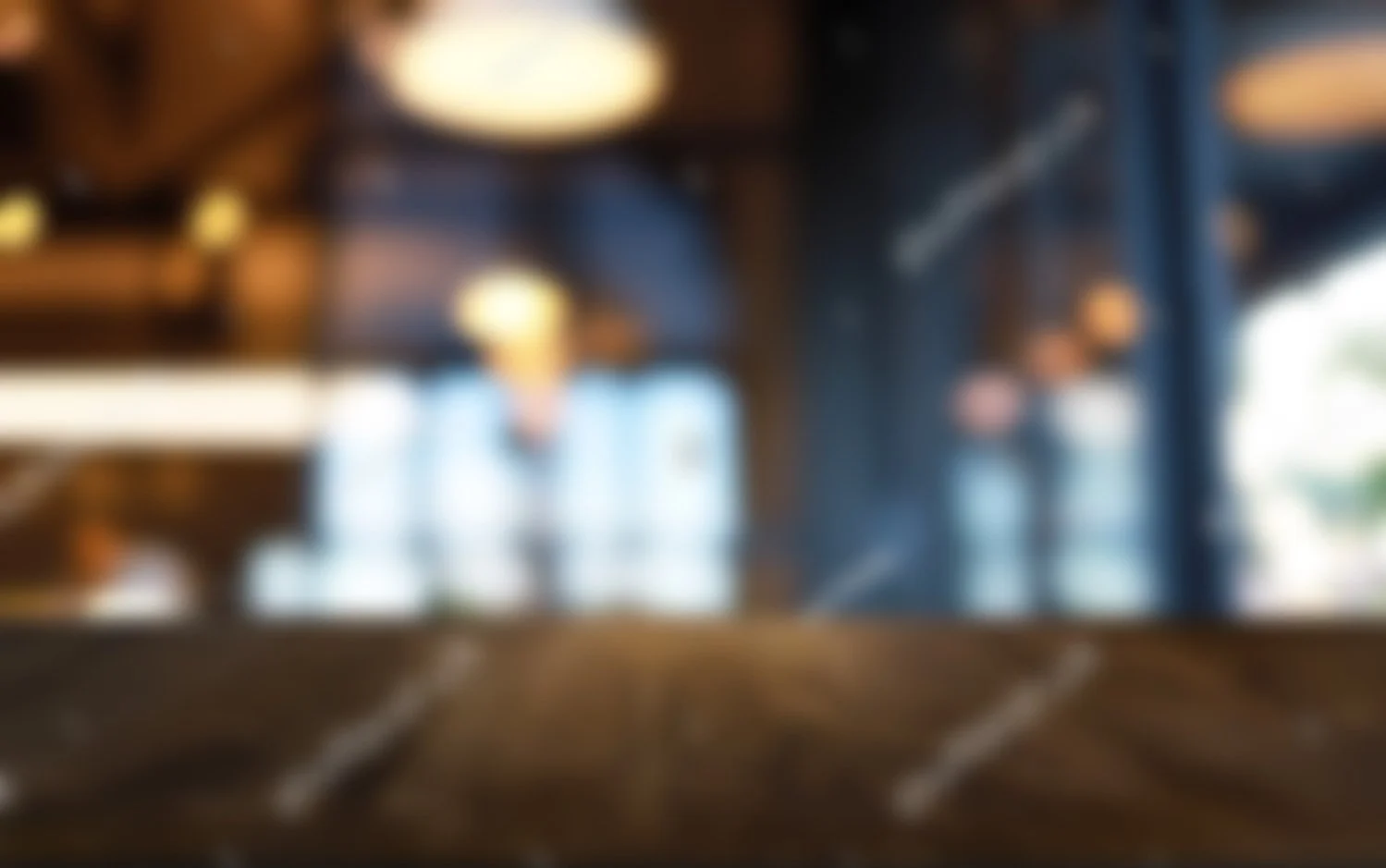 stock-photo-empty-wooden-table-in-front-of-abstract-blurred-background-of-coffee-shop-wood-table-in-front-can-1924194527.jpg
