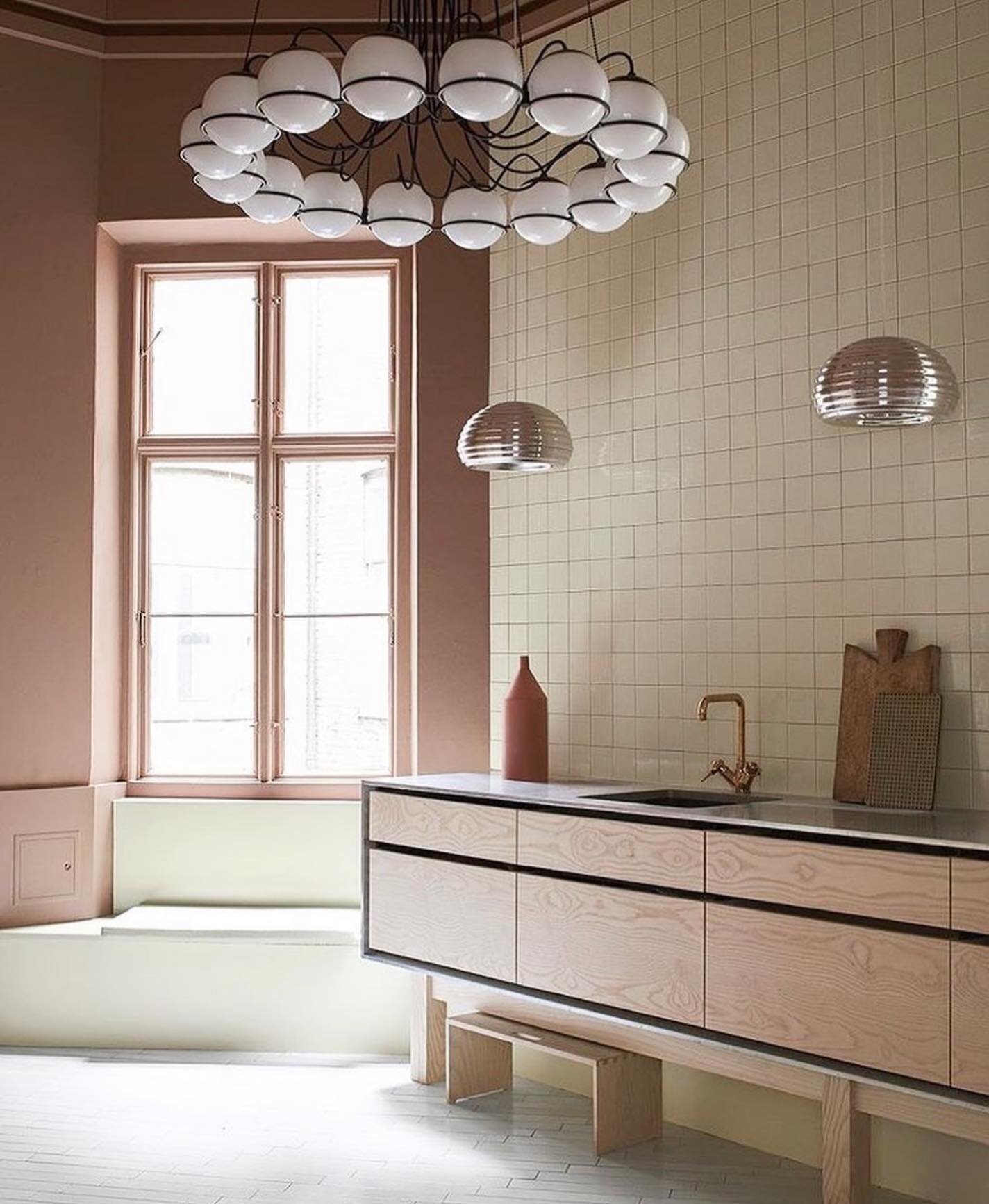 When modernist meets modern minimal &mdash; Adore this combo of the @gardehvalsoe kitchen and the &lsquo;Model 2109&rsquo; pendant by @astep.design in the showroom of @fileunderpop // Love how the soft wall colour is picked up in the @dinesen Douglas